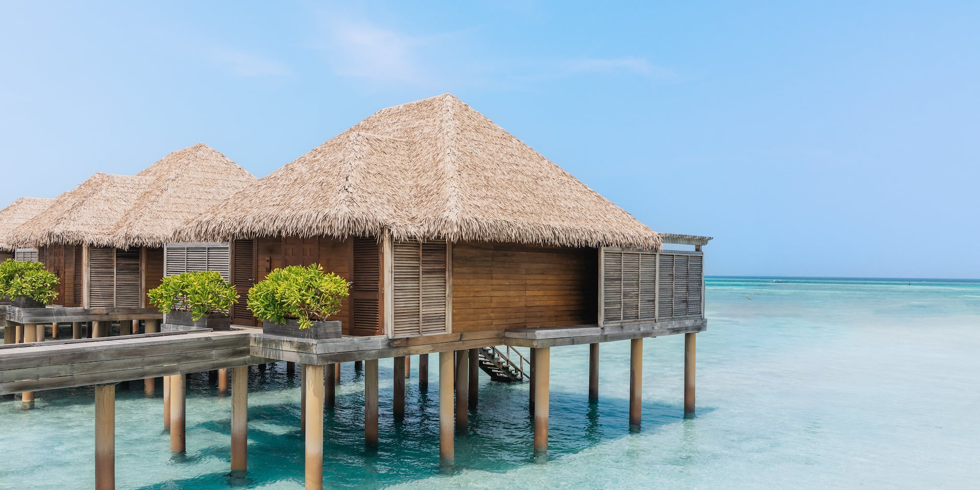 a building on stilts in the water