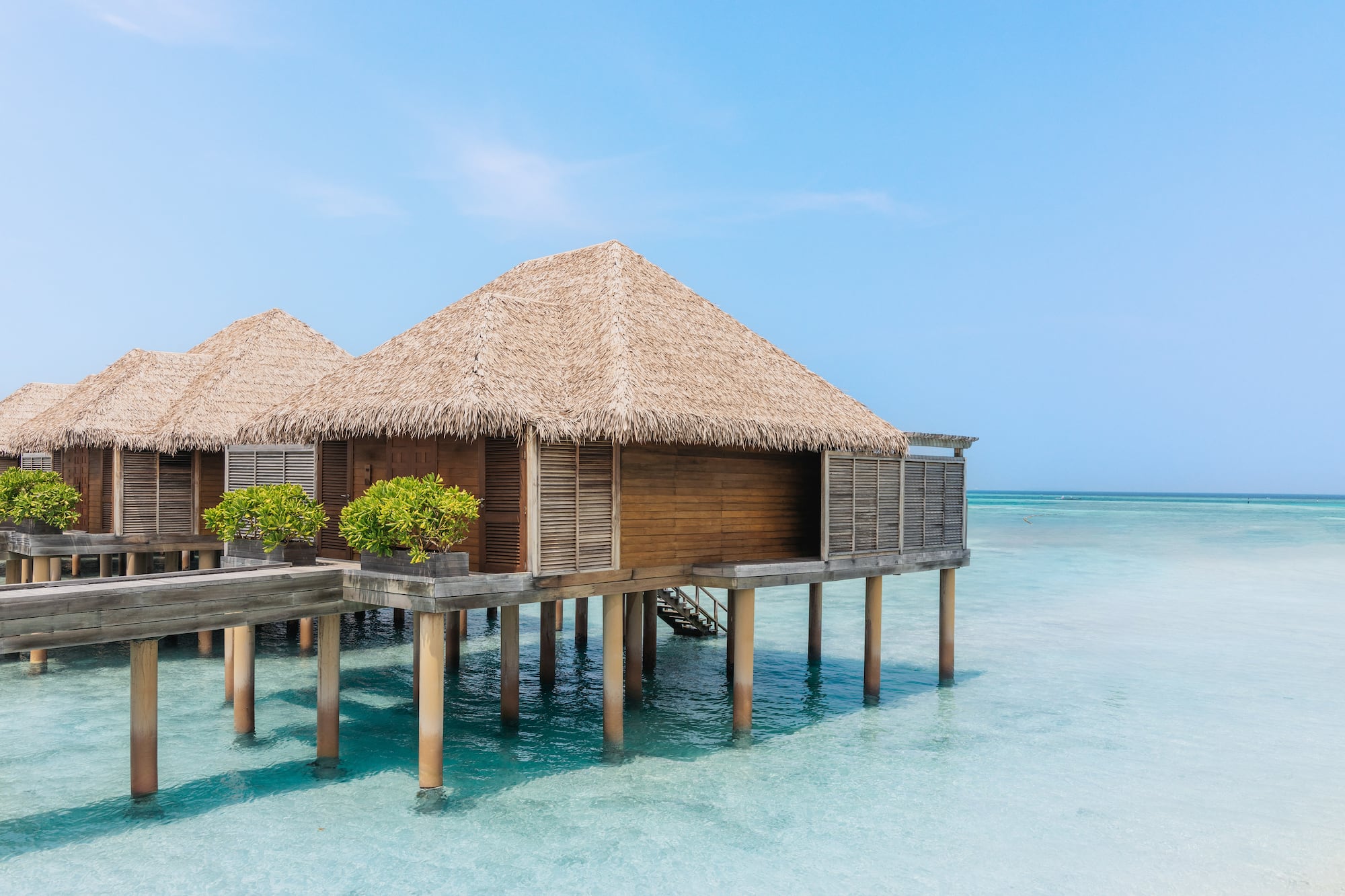 a building on stilts in the water