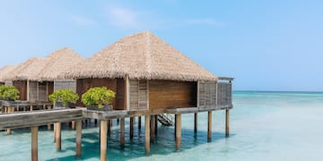 a building on stilts in the water