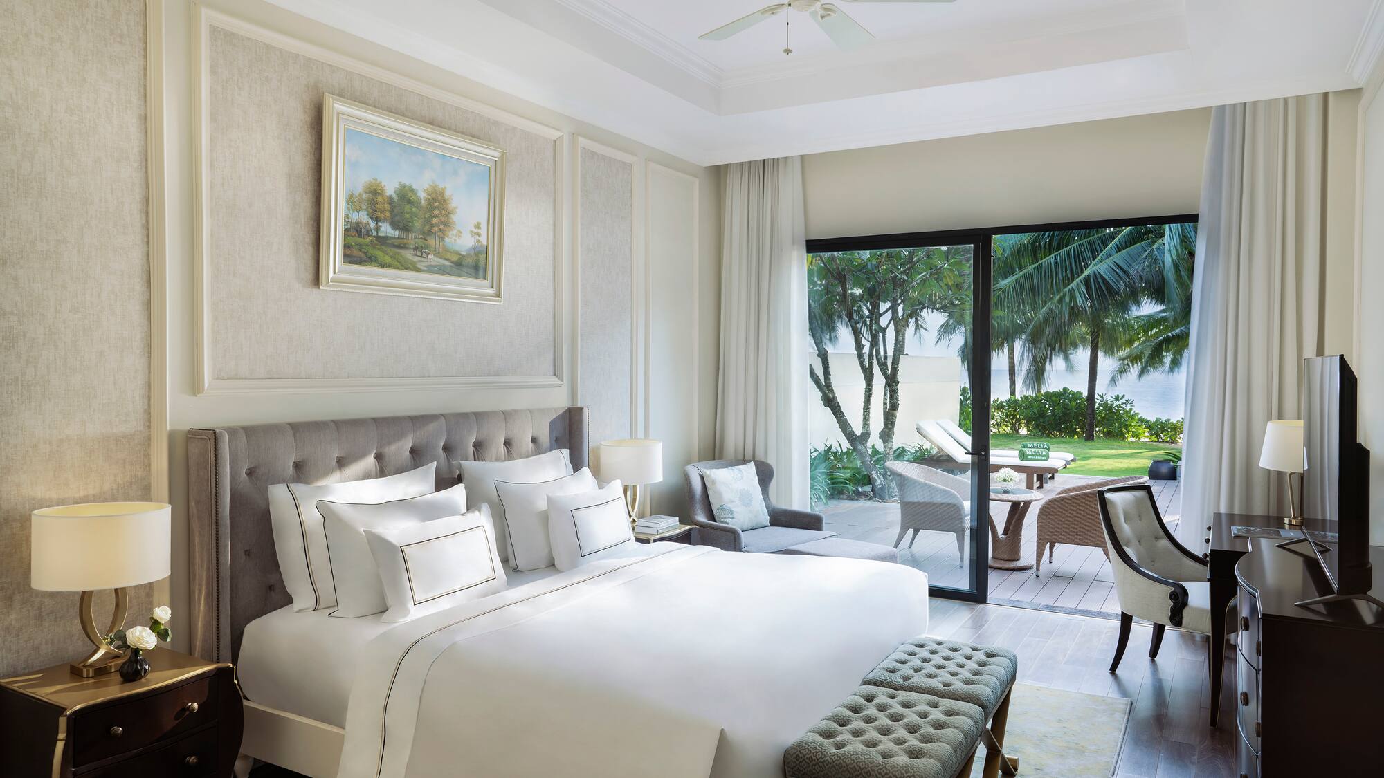 a bedroom with a bed and a patio door