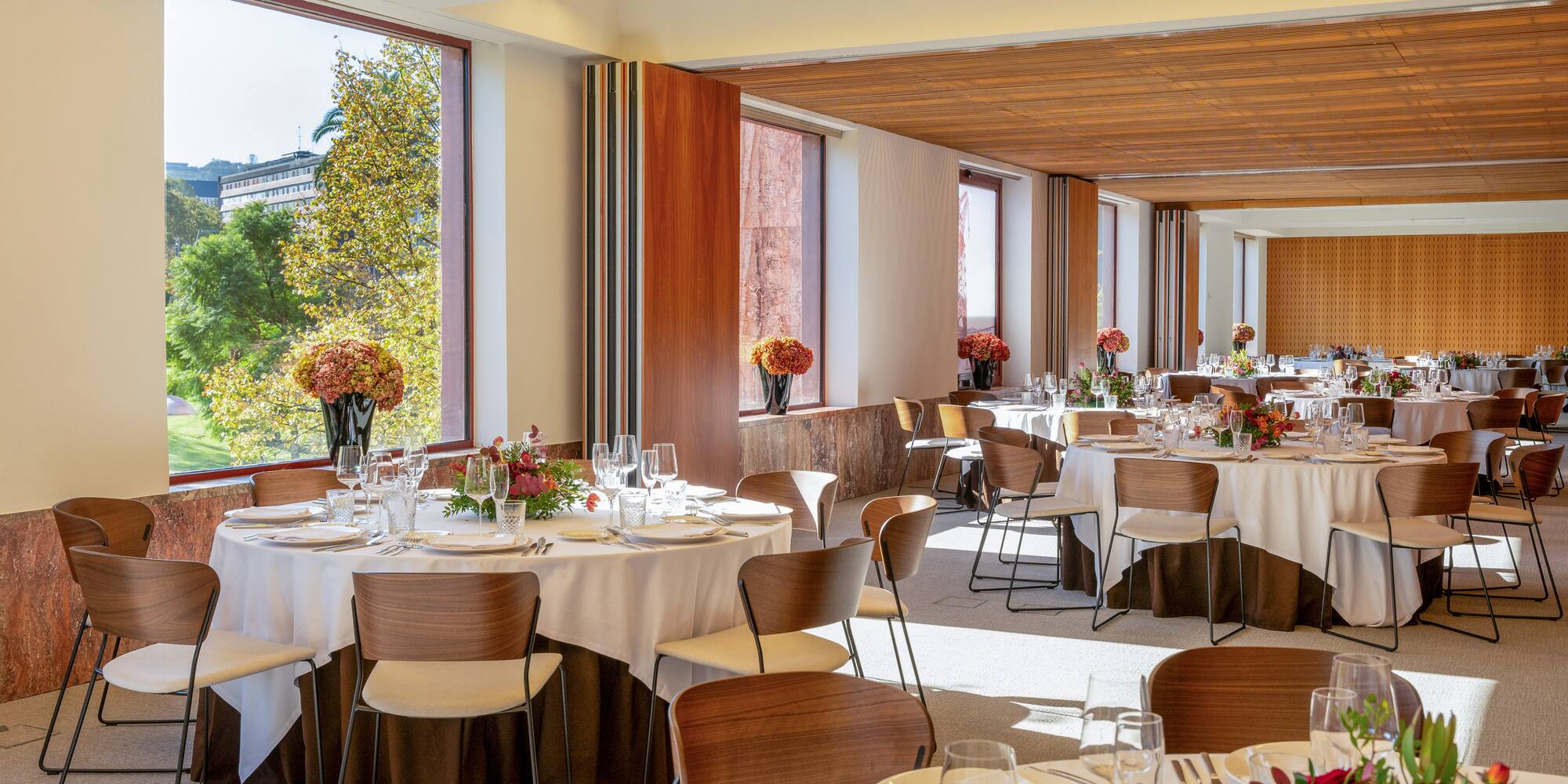 a room with tables and chairs