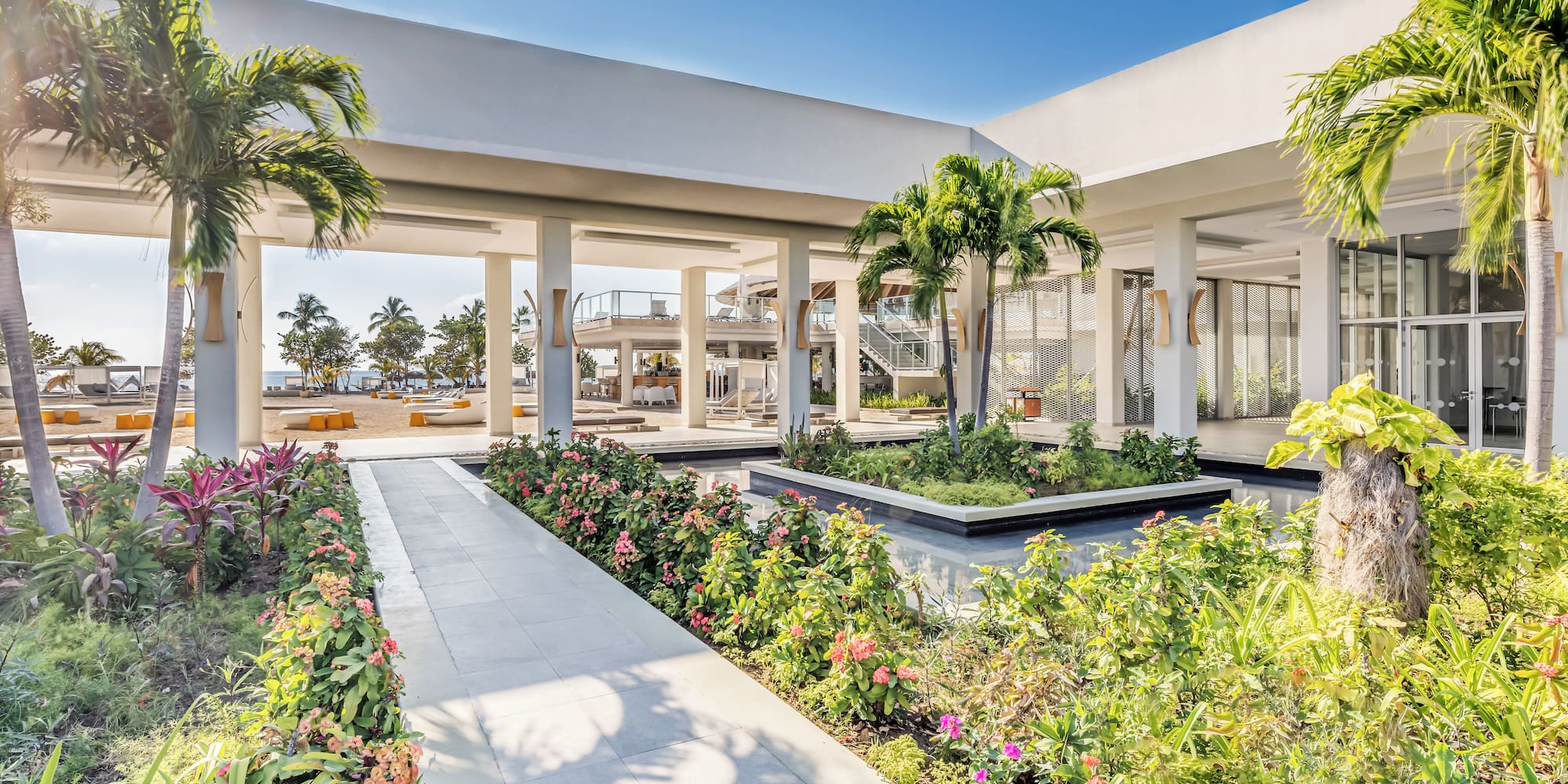 a building with a garden and plants