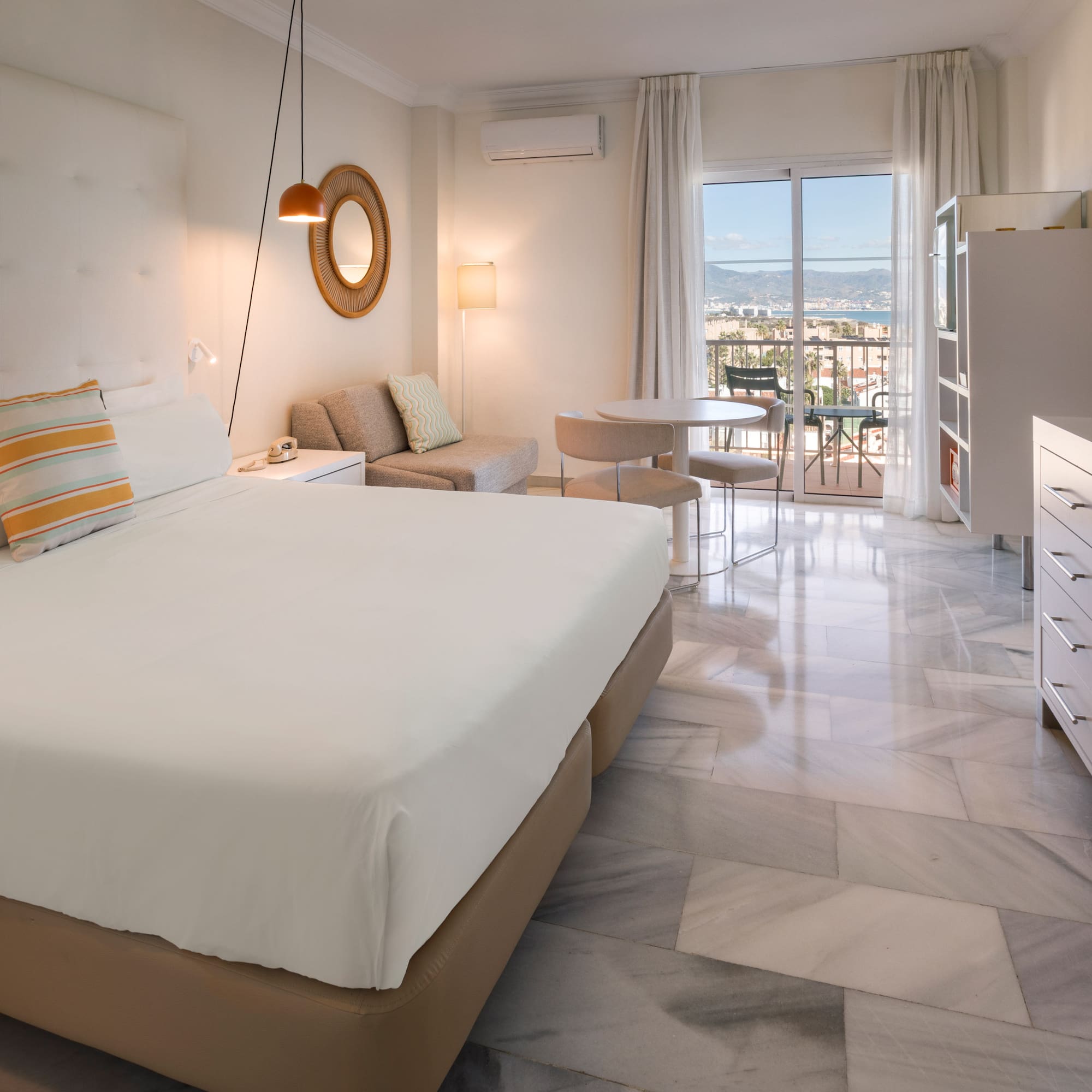 a bedroom with a bed and a table