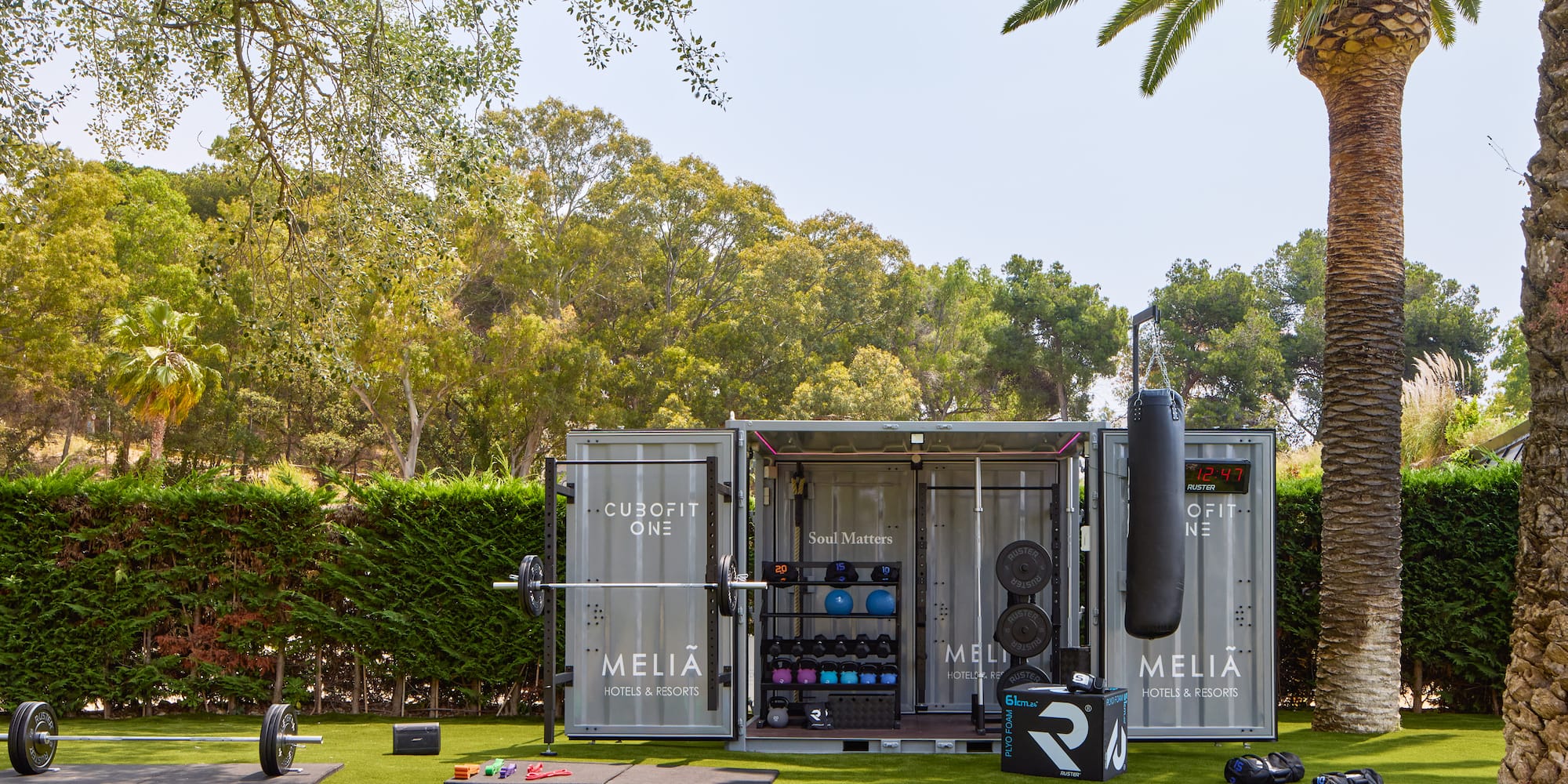 a container with equipment on grass
