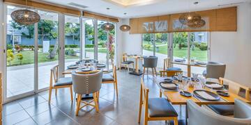 a room with tables and chairs