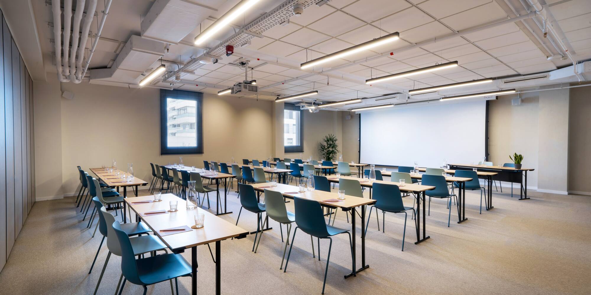 a room with tables and chairs