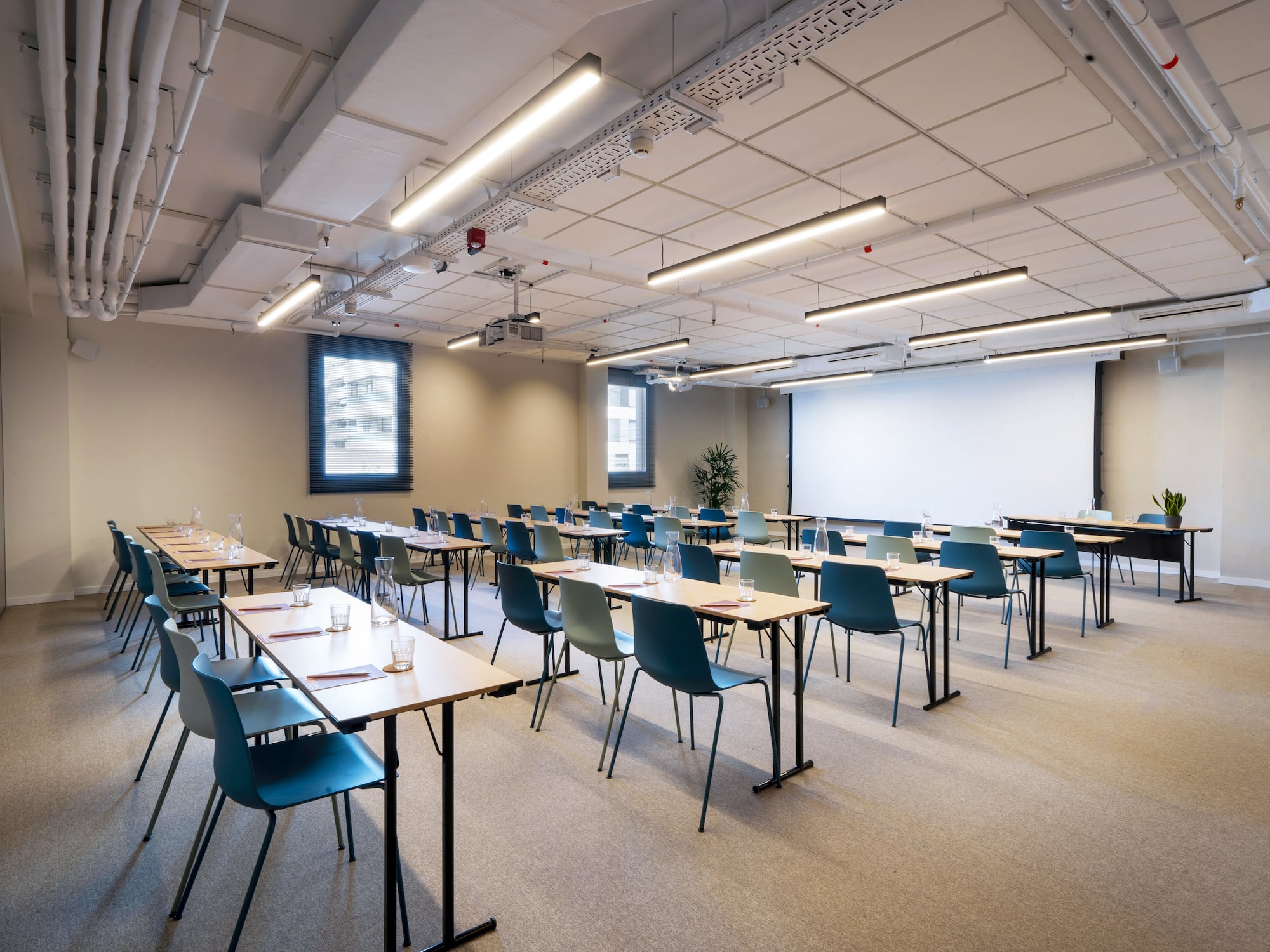 a room with tables and chairs