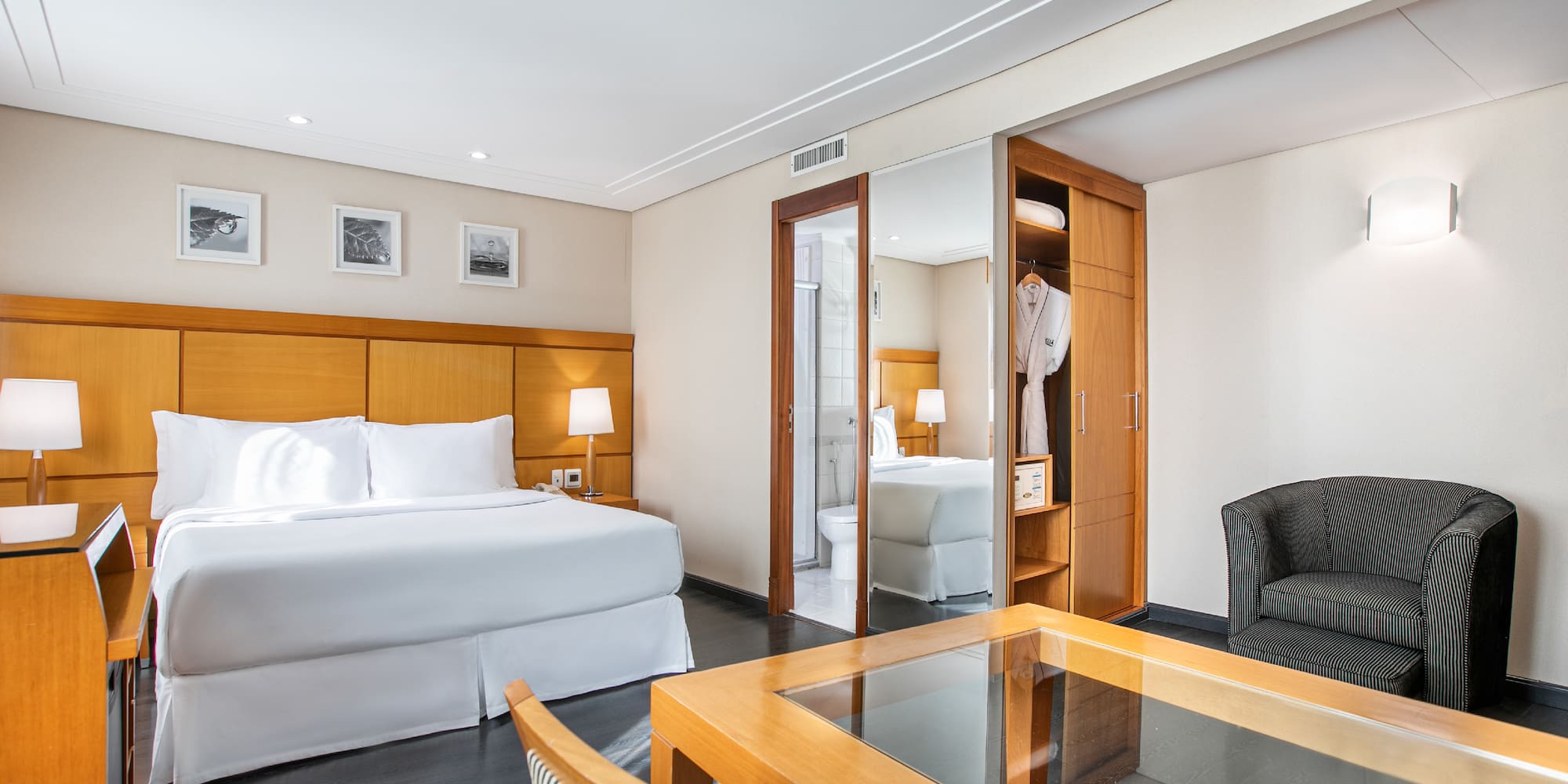 a room with a bed and a chair