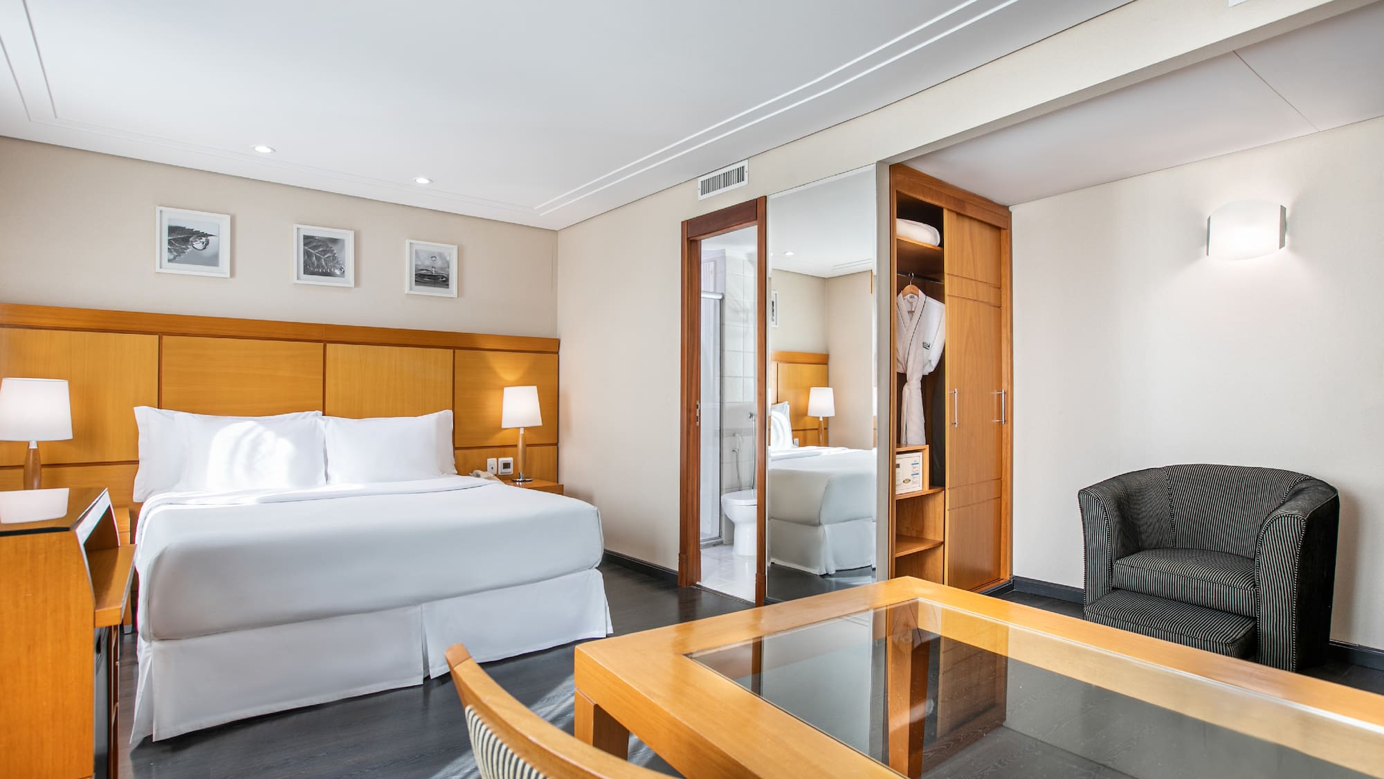 a room with a bed and a chair