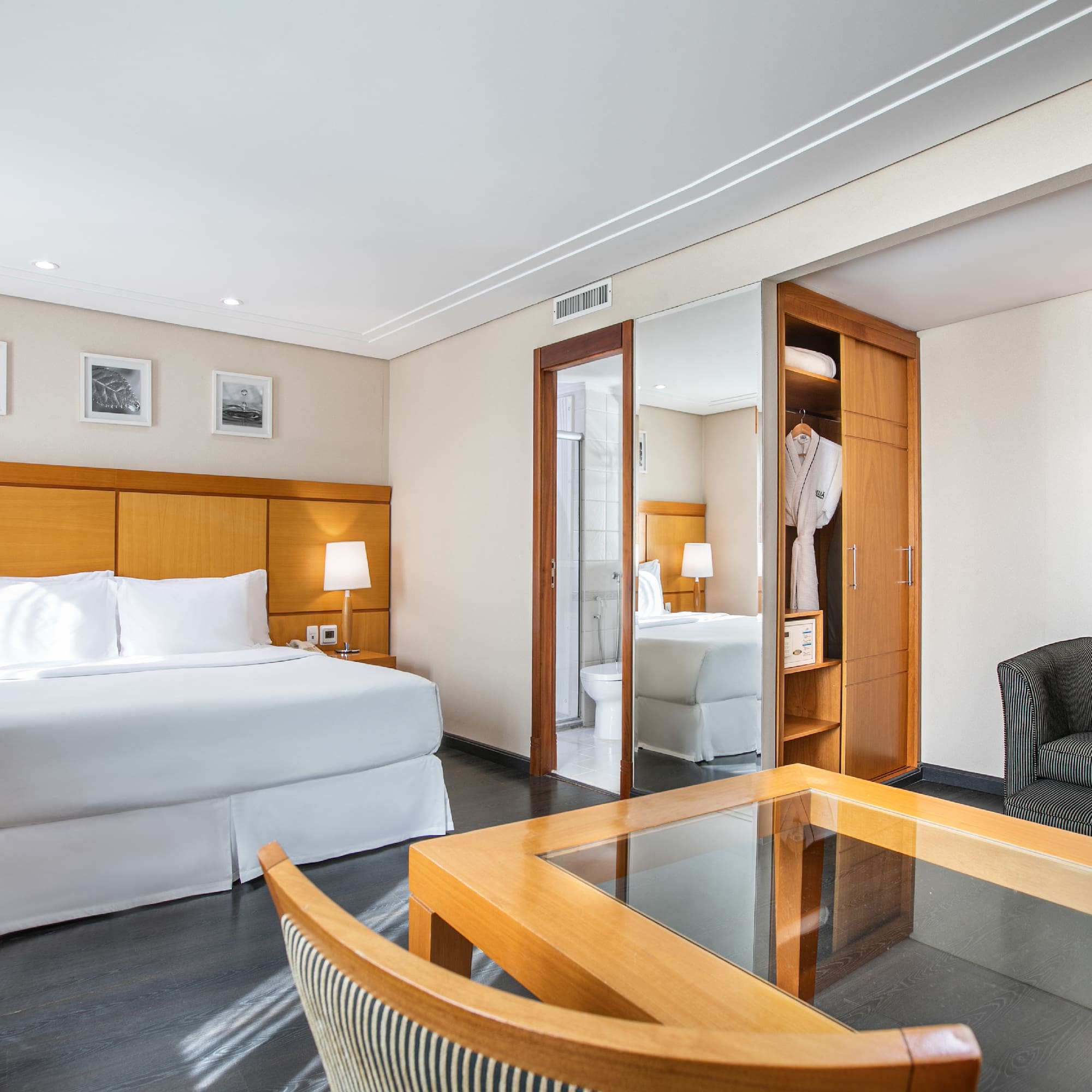 a room with a bed and a chair