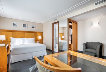 a room with a bed and a chair