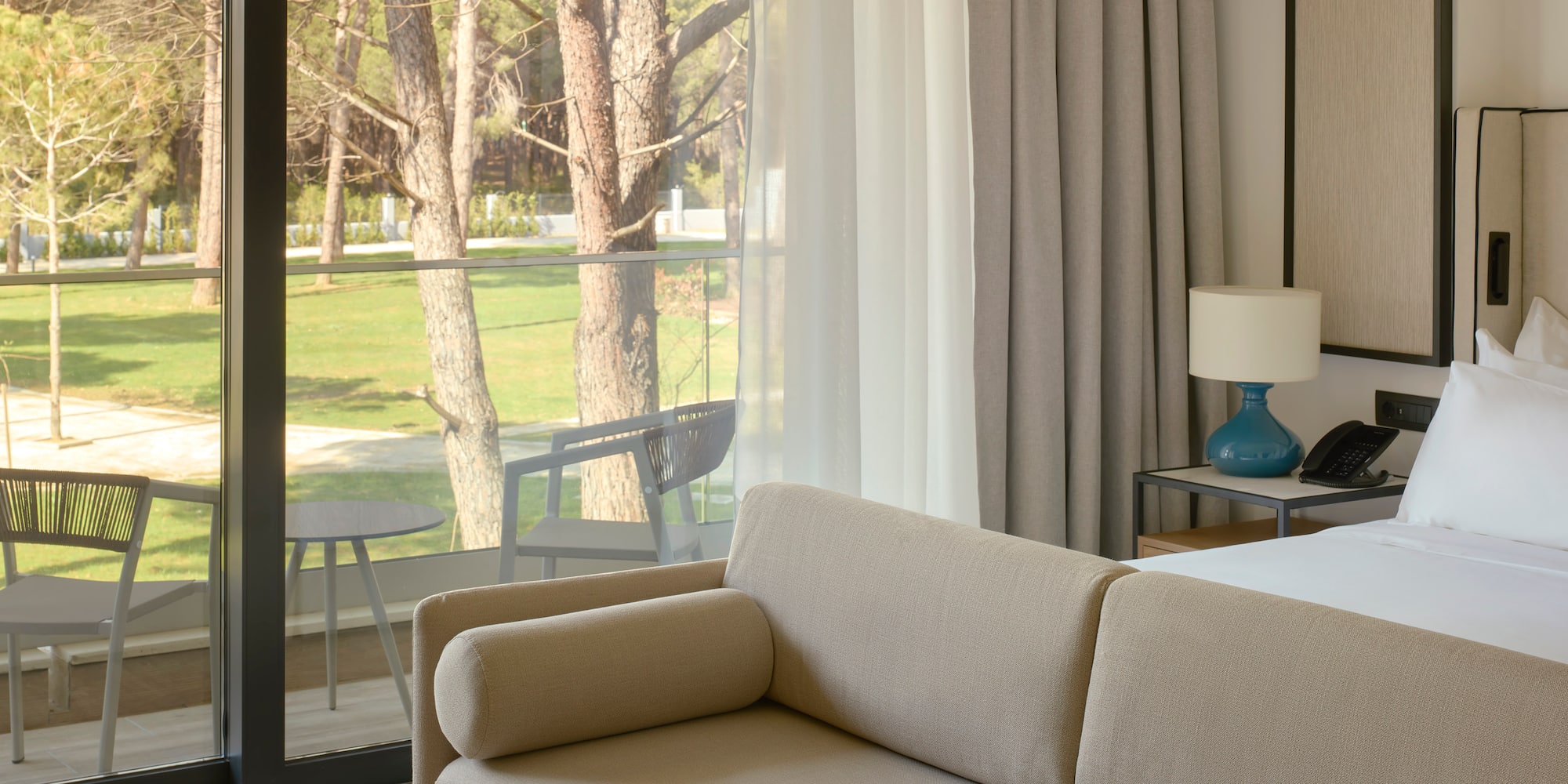 a couch in a room with a glass door