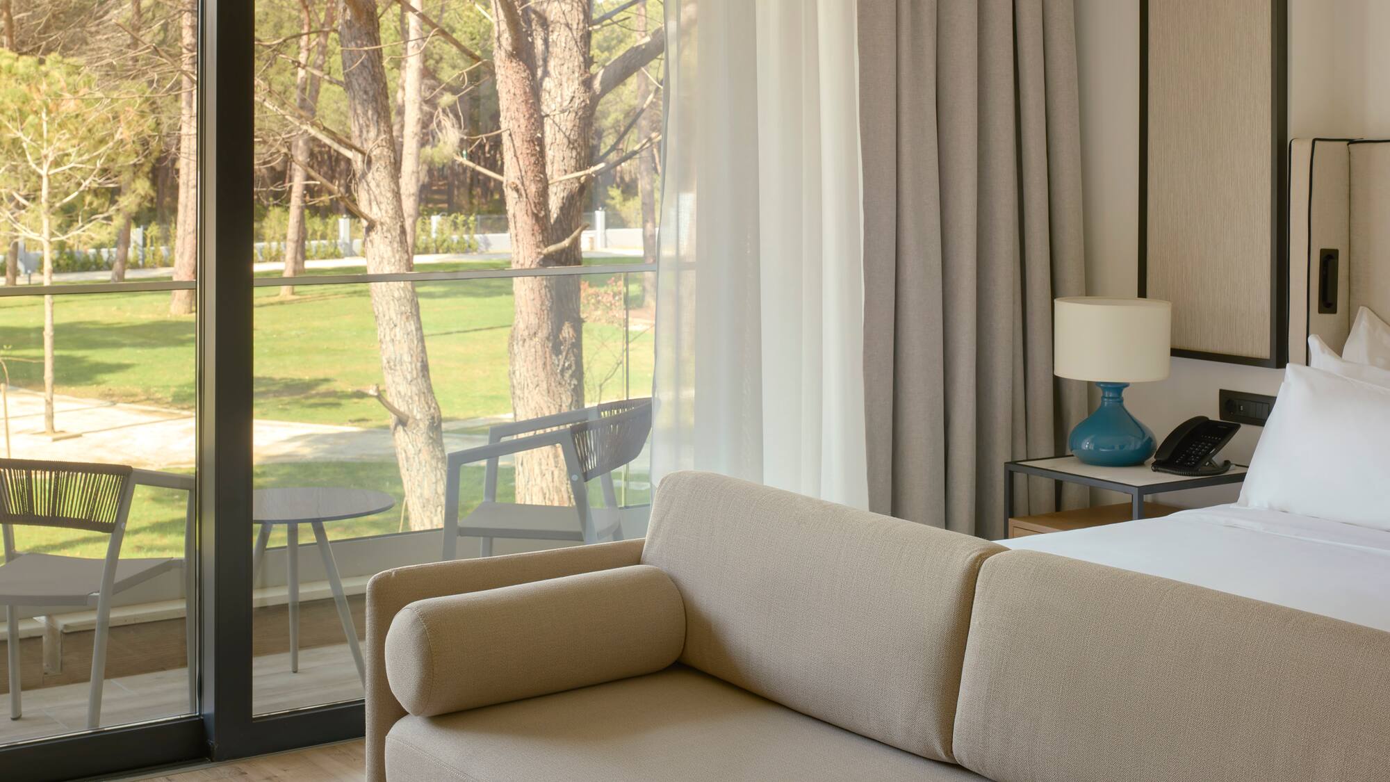 a couch in a room with a glass door