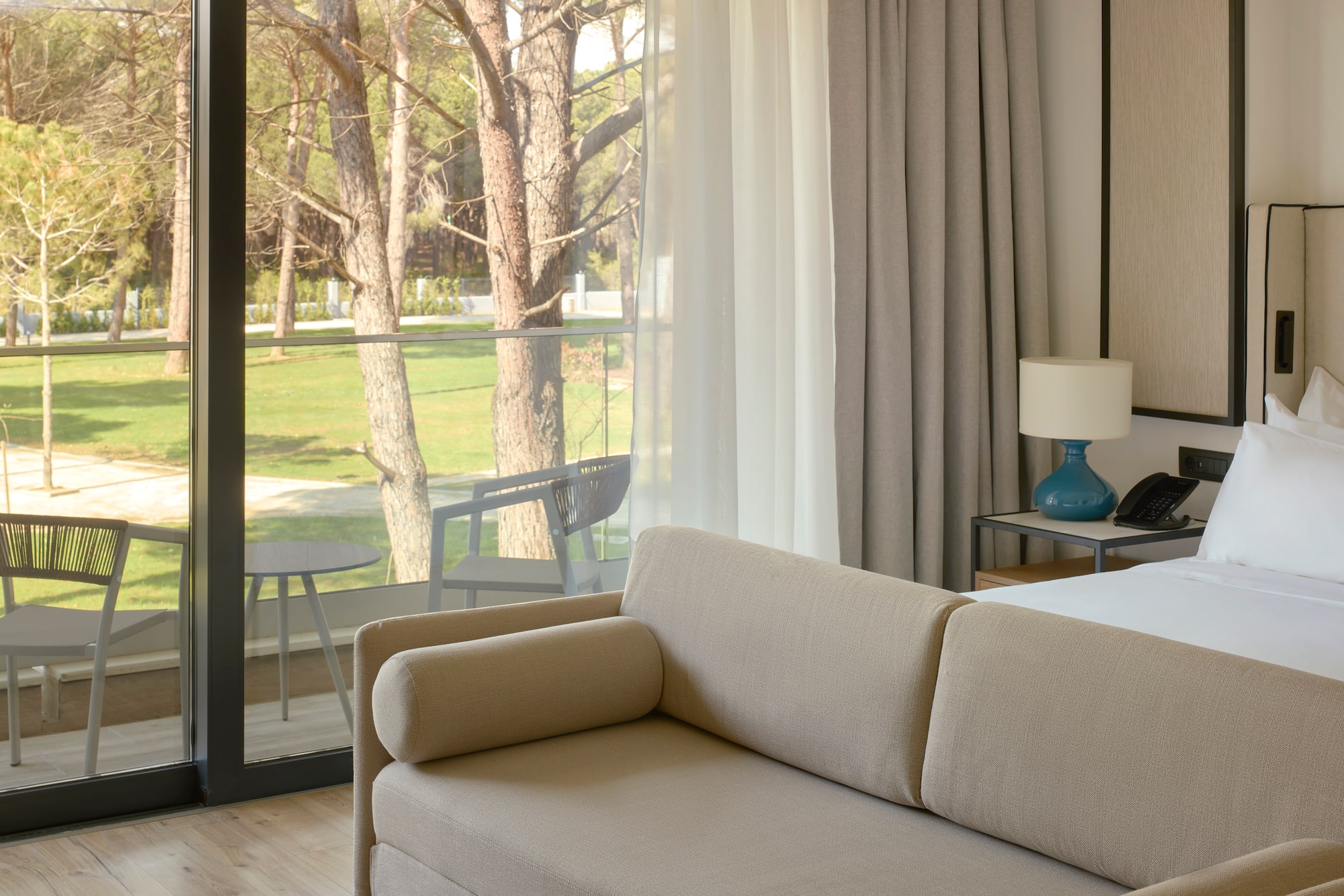 a couch in a room with a glass door