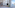 Moderna habitación de hotel con vistas al mar y bahía, barcos y TV.