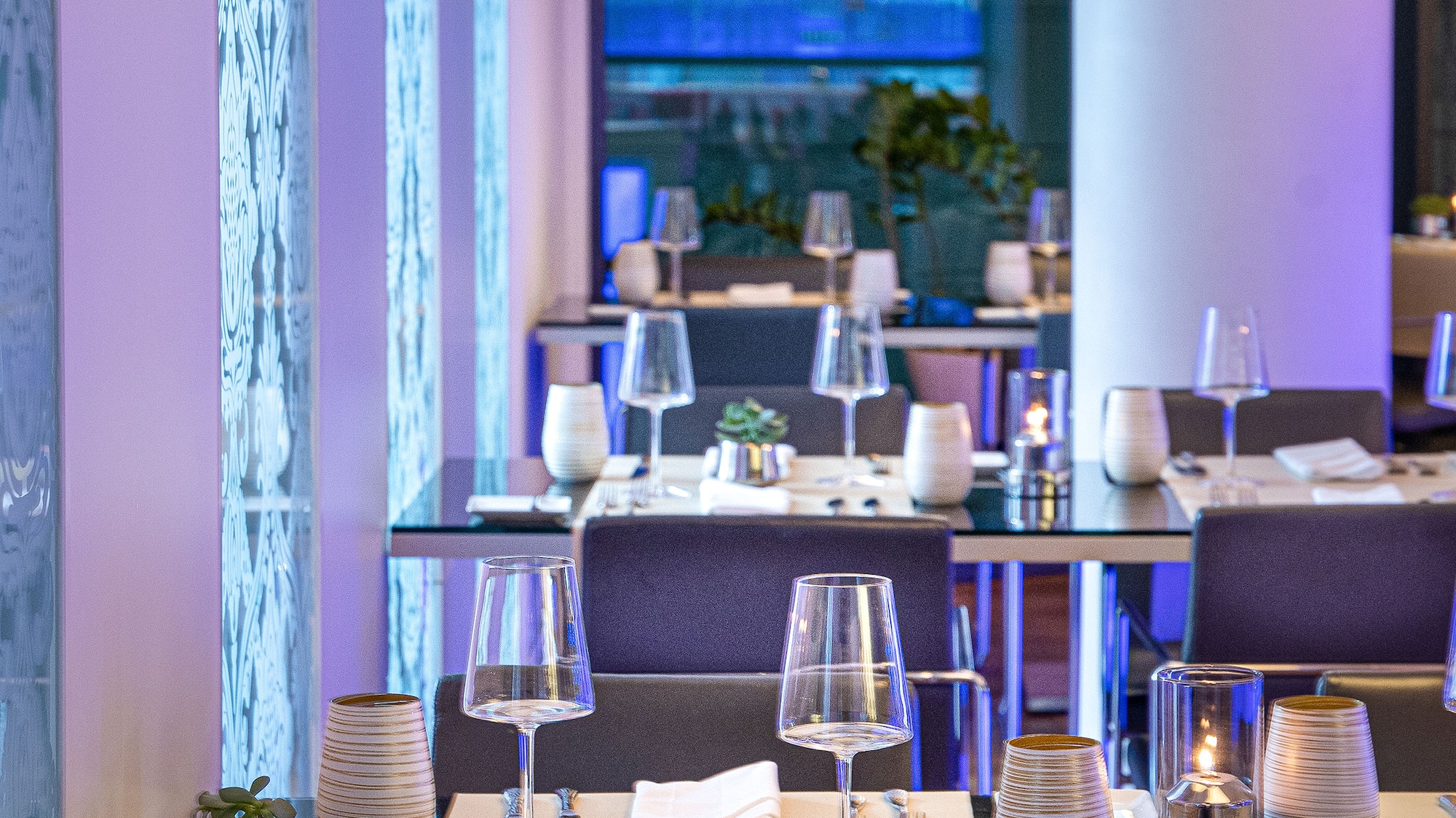 a restaurant with tables and chairs