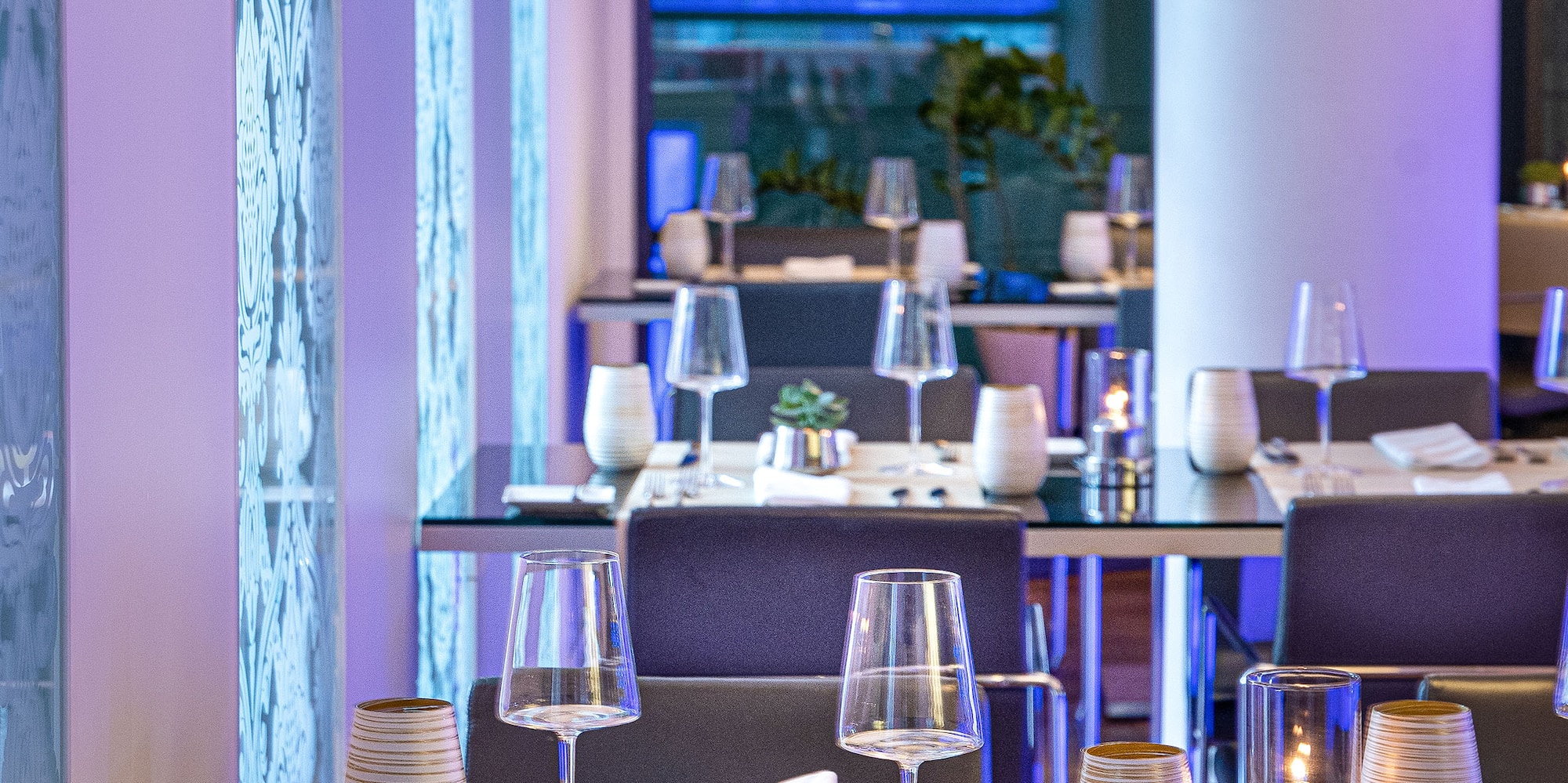 a restaurant with tables and chairs