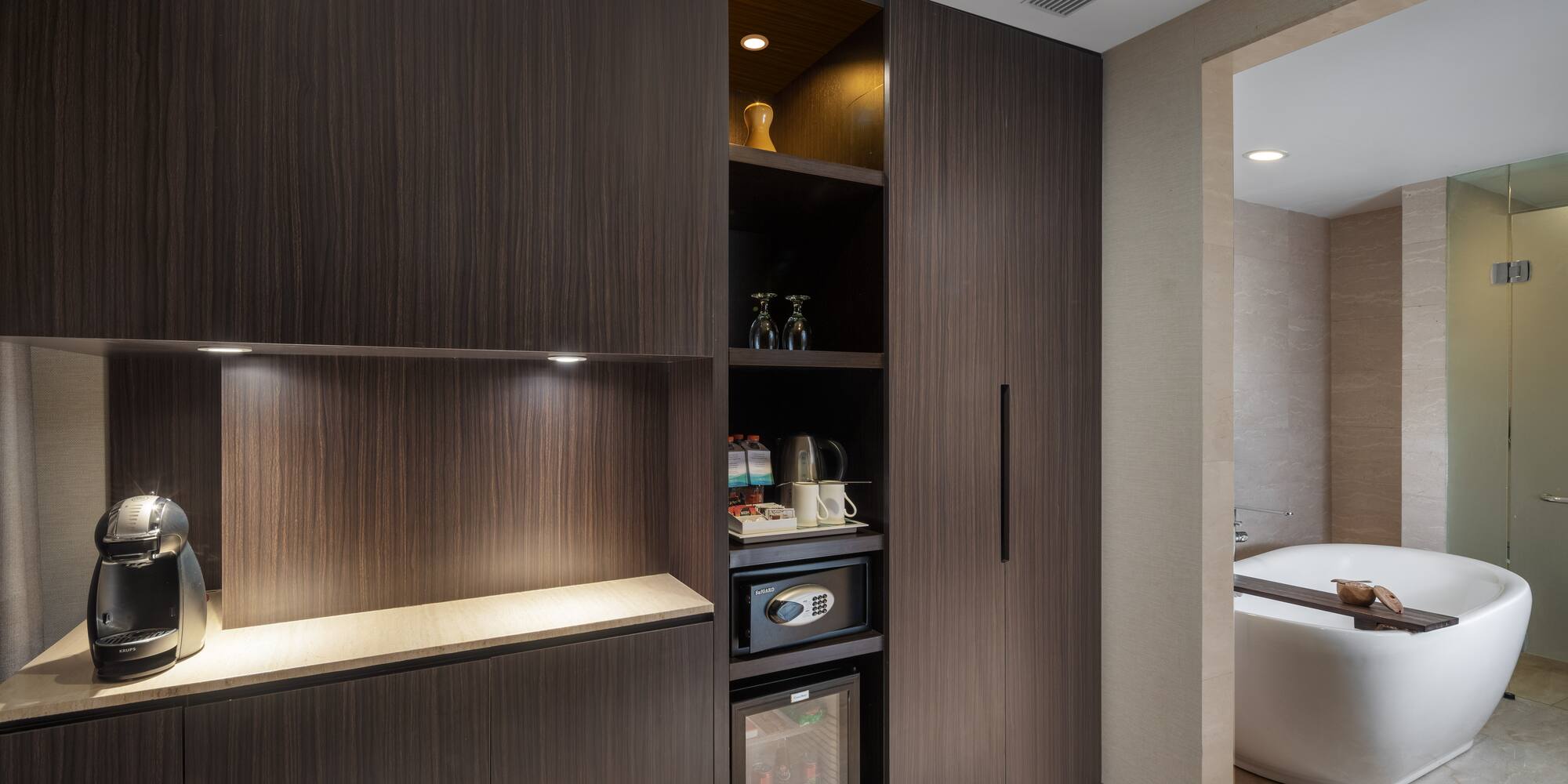 a room with a tub and a cabinet