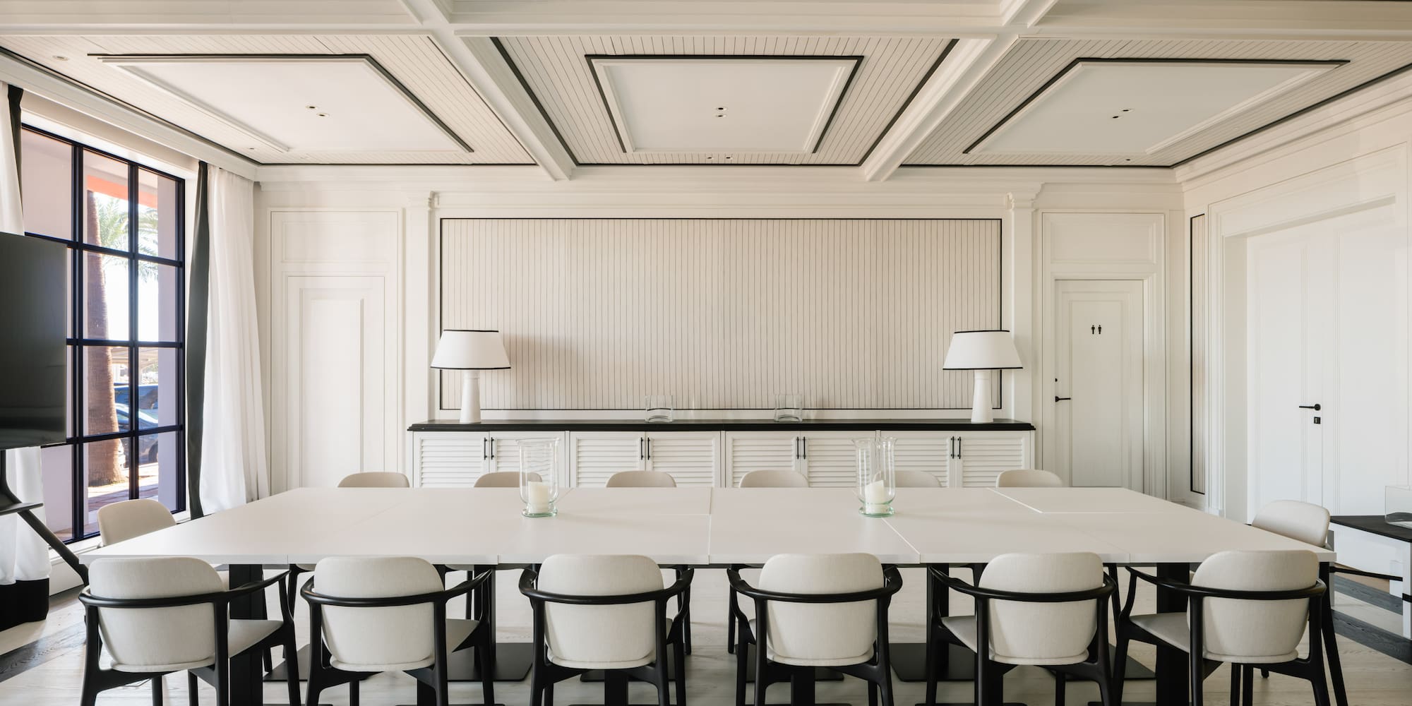 a room with a table and chairs
