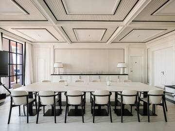 a room with a table and chairs