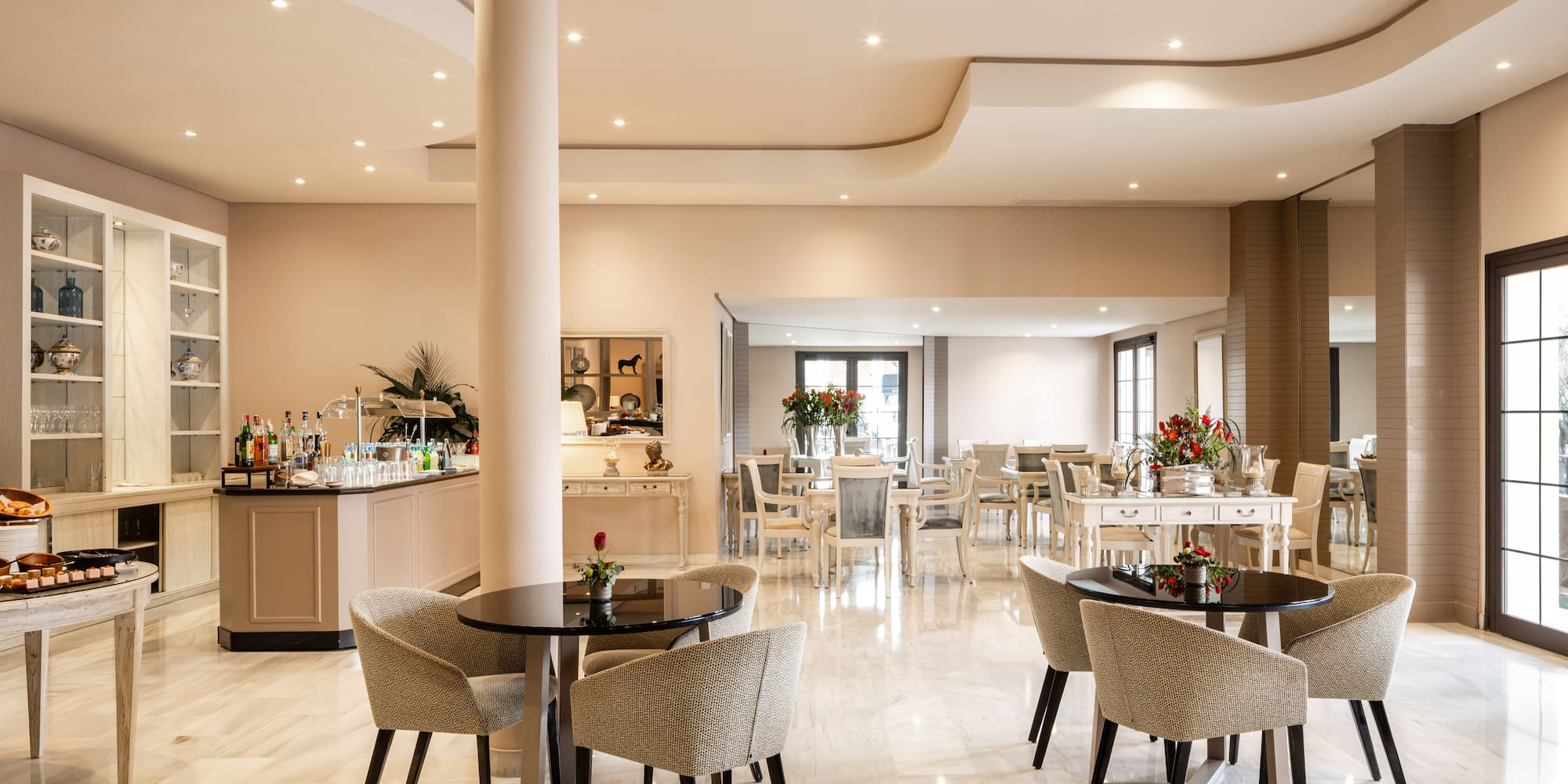 a room with tables and chairs