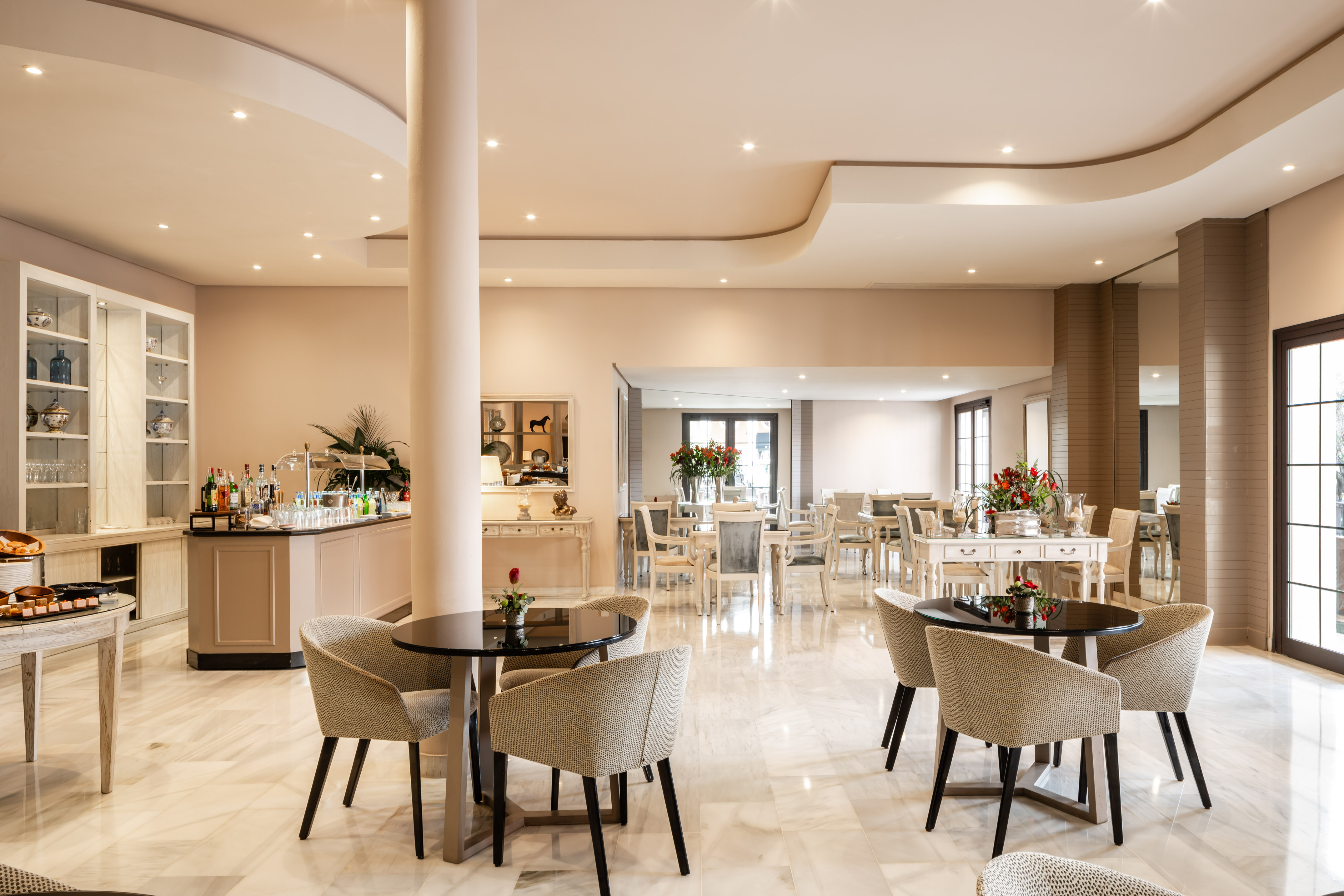 a room with tables and chairs