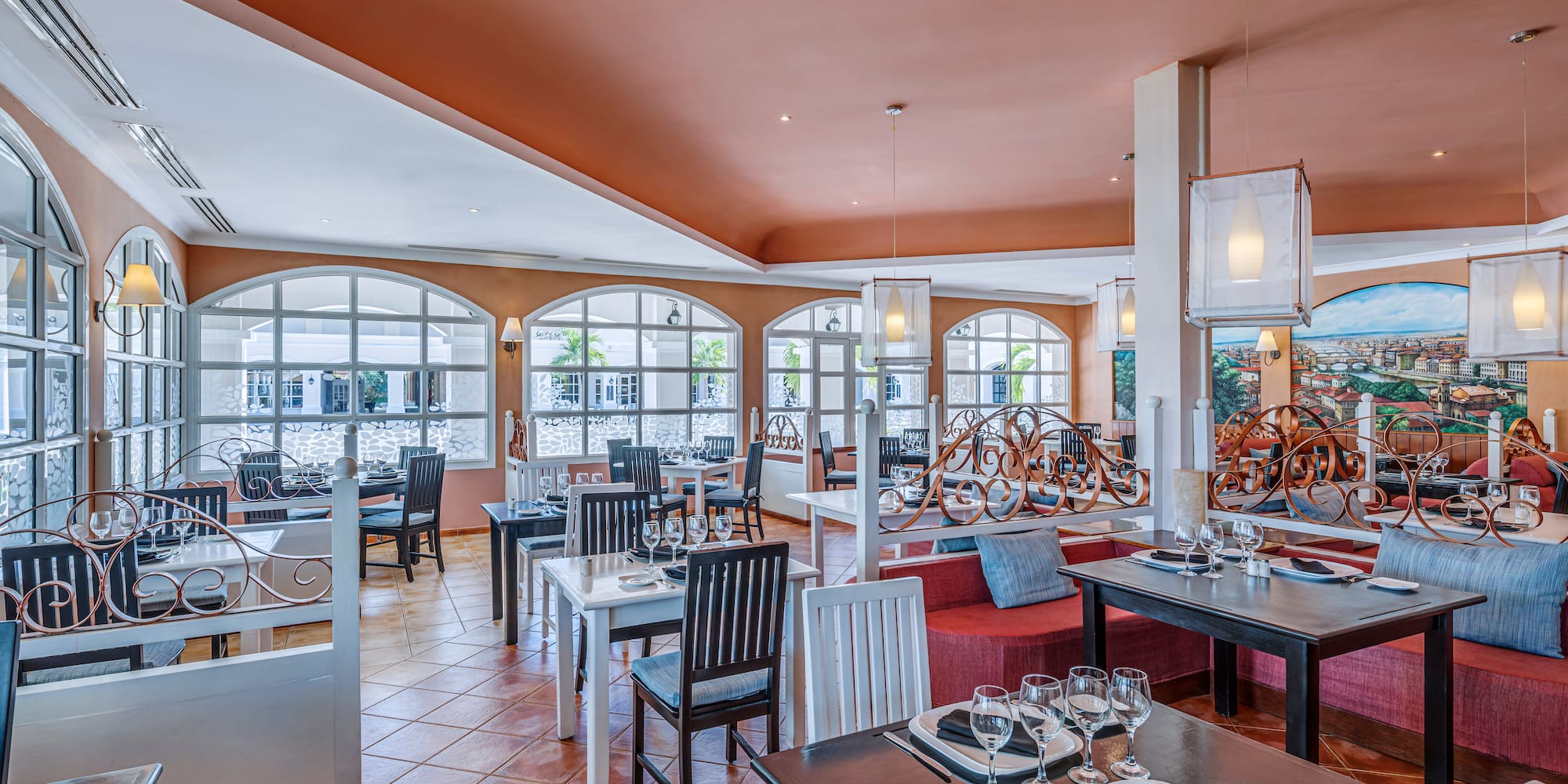 a room with tables and chairs