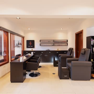 a room with chairs and a table