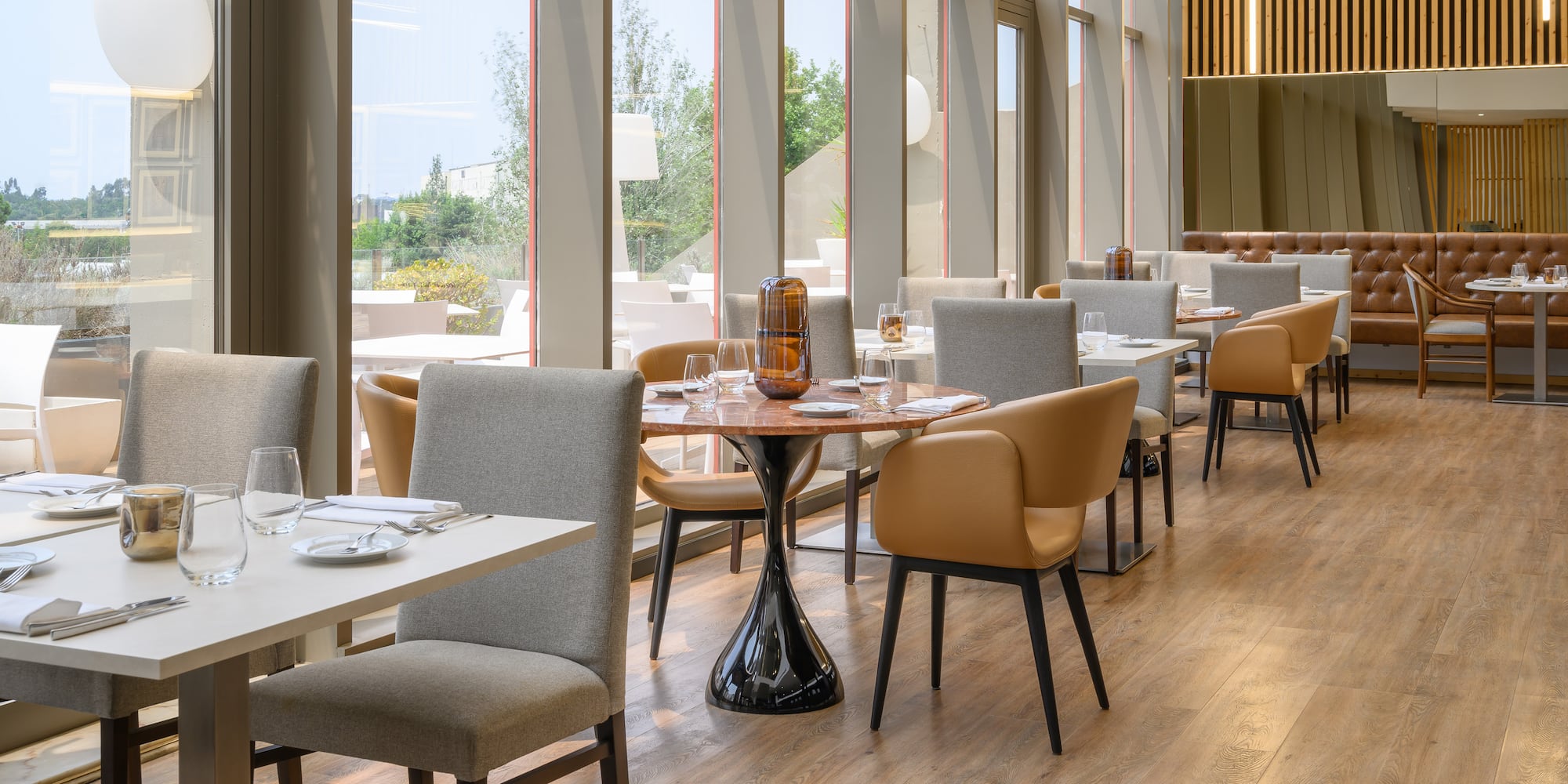a restaurant with tables and chairs