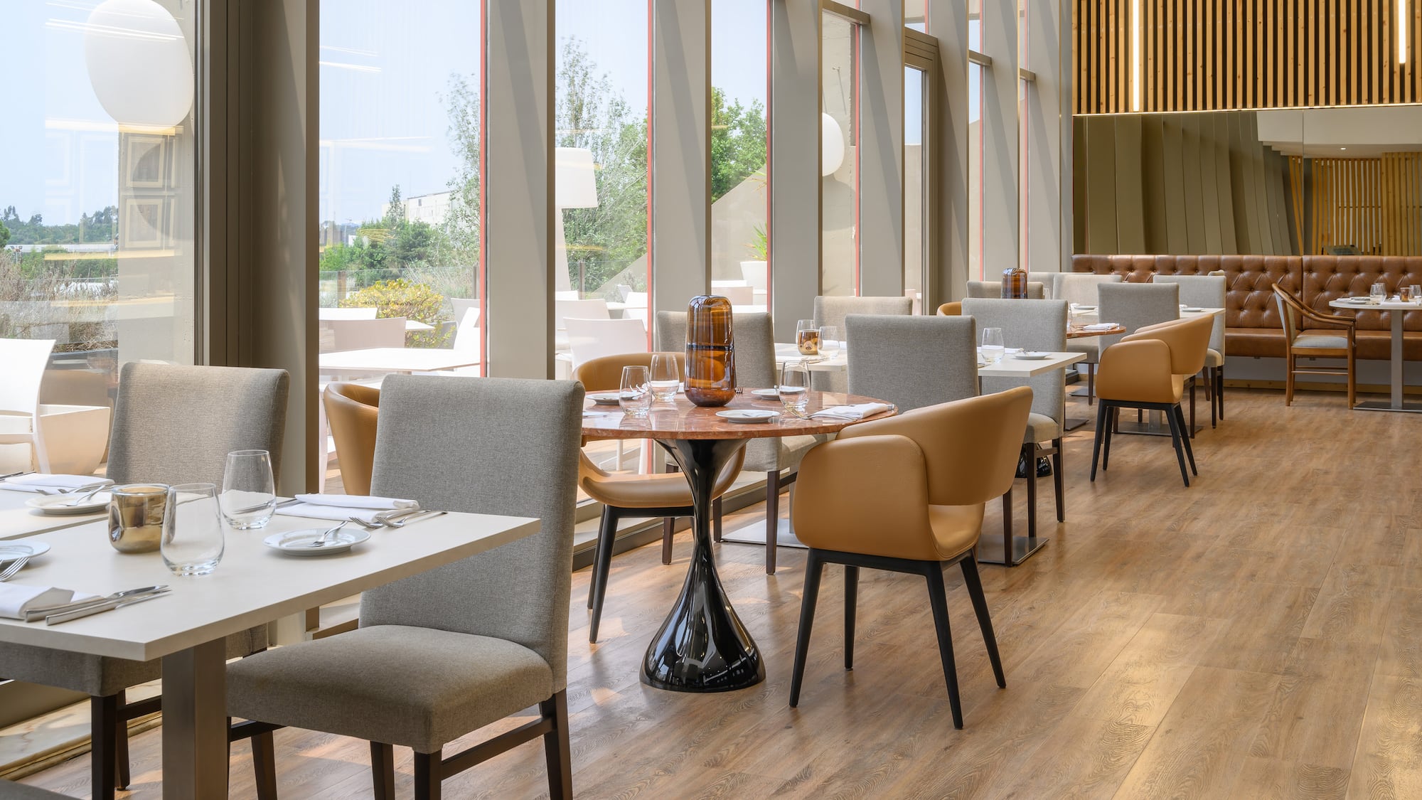 a restaurant with tables and chairs