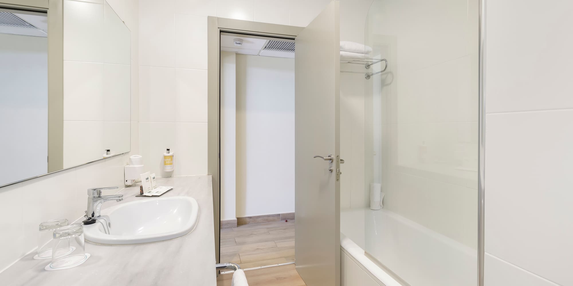 a bathroom with a sink and a bathtub