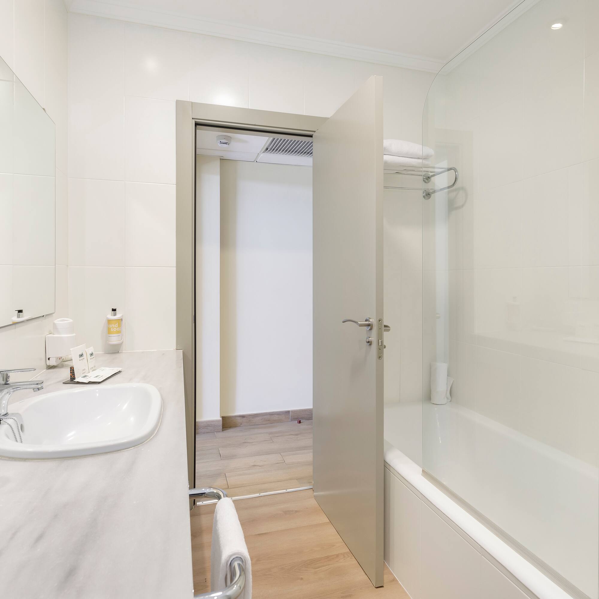 a bathroom with a sink and a bathtub