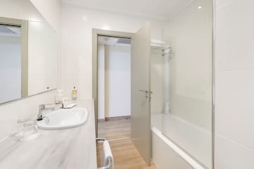 a bathroom with a sink and a bathtub