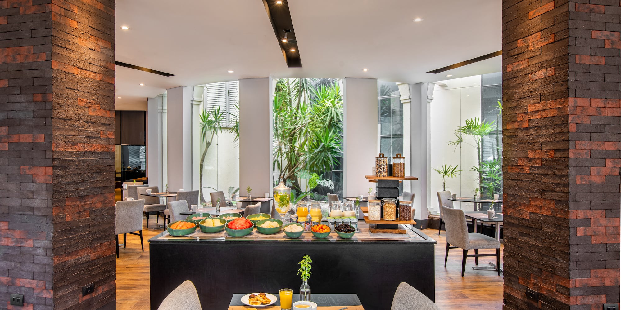 a restaurant with a table of food