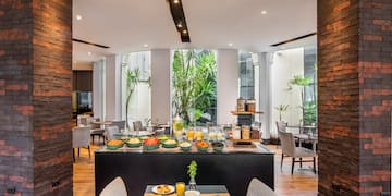 a restaurant with a table of food