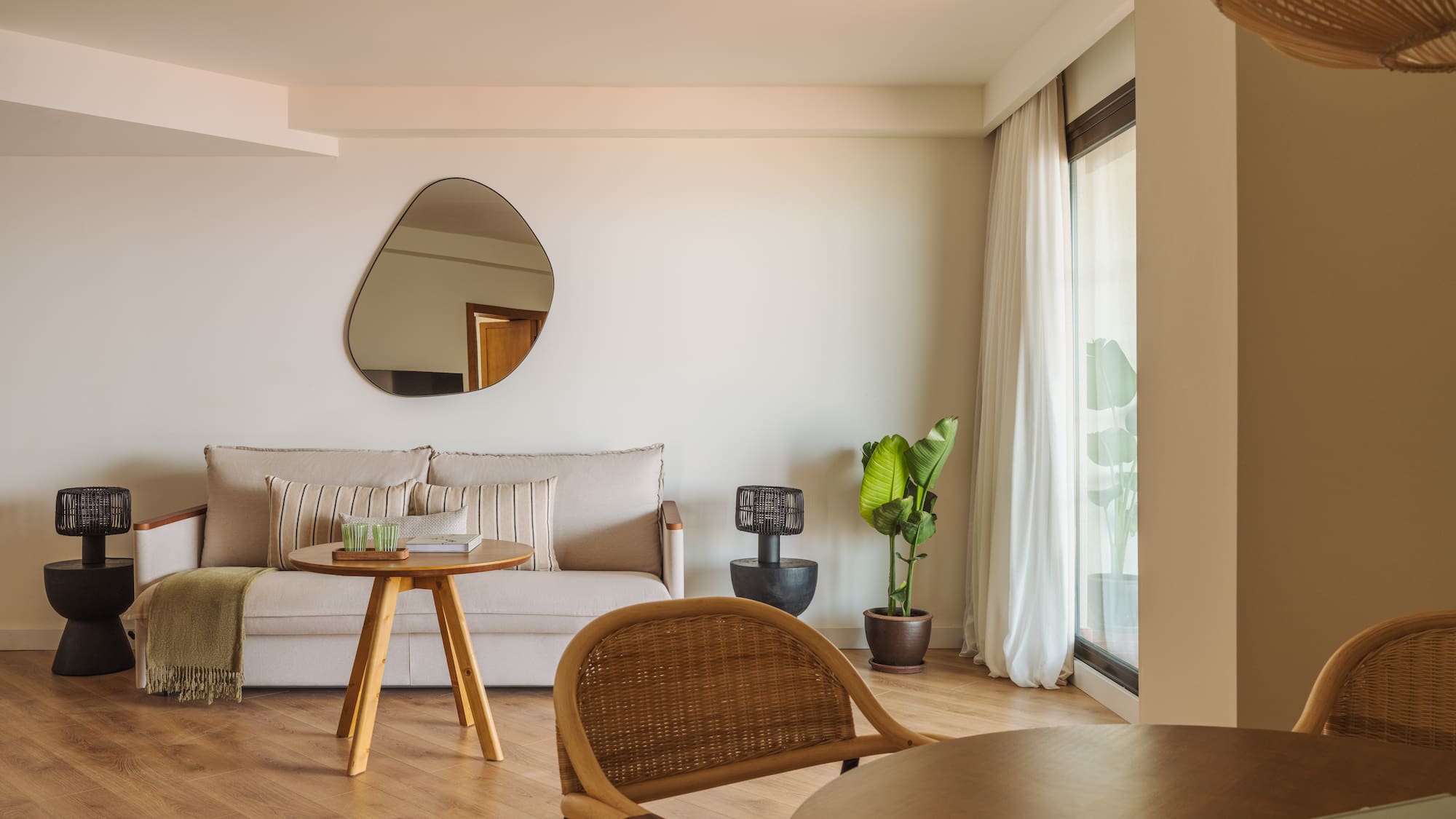 a living room with a couch and a table