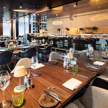 a restaurant with tables and chairs