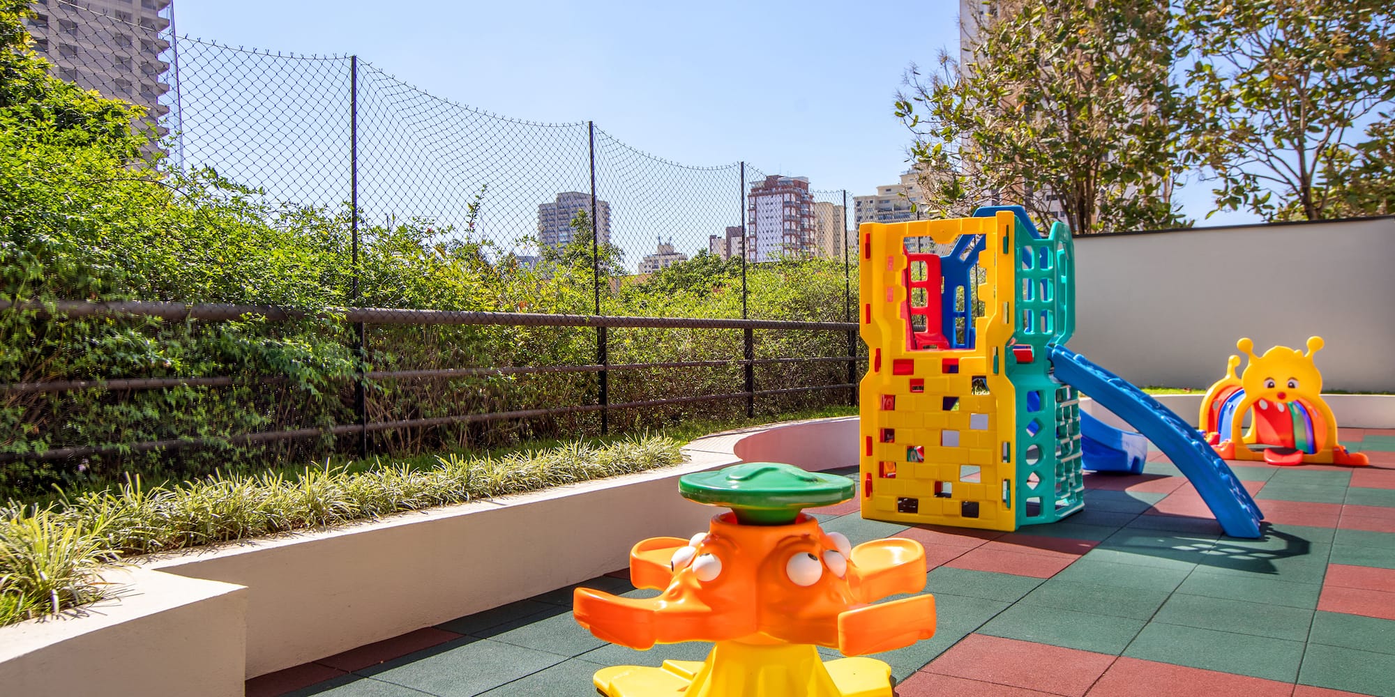 a playground with a slide and a play set