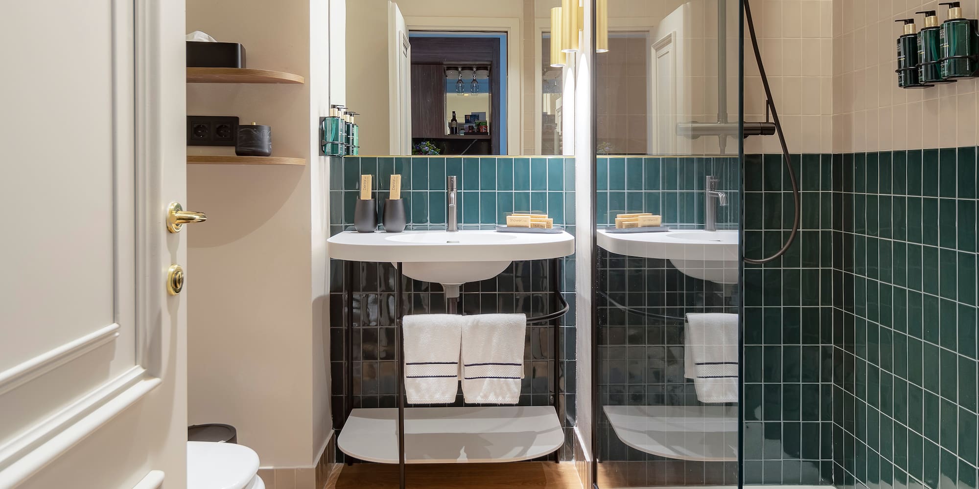 a bathroom with a shower and sink