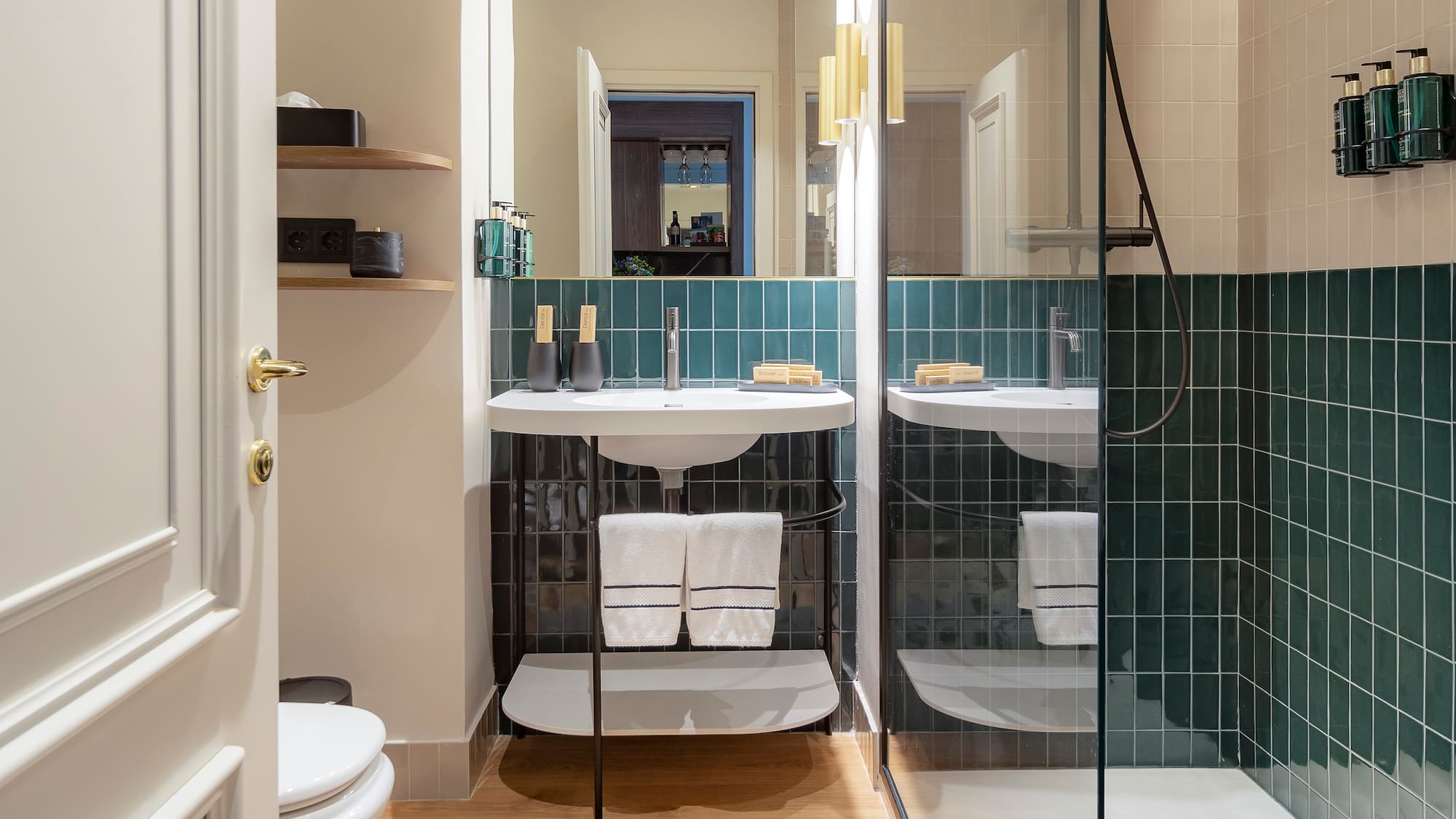 a bathroom with a shower and sink