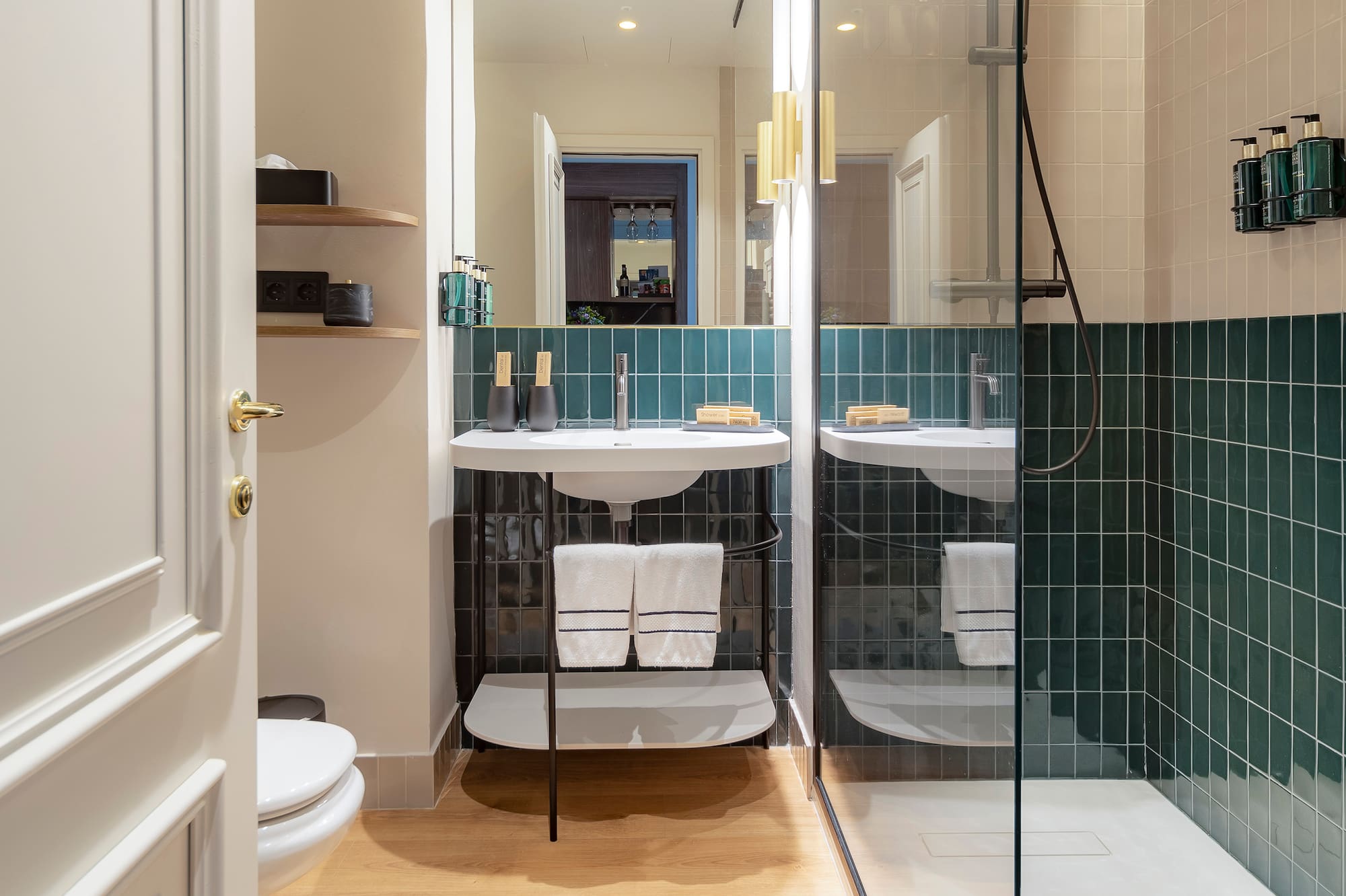 a bathroom with a shower and sink