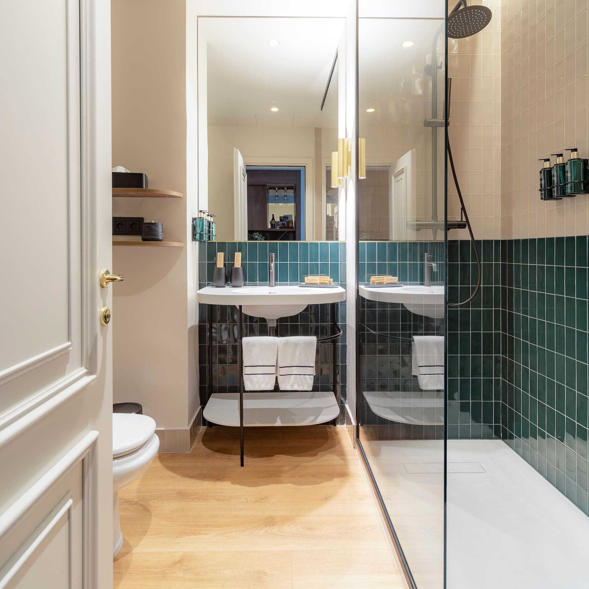 a bathroom with a shower and sink