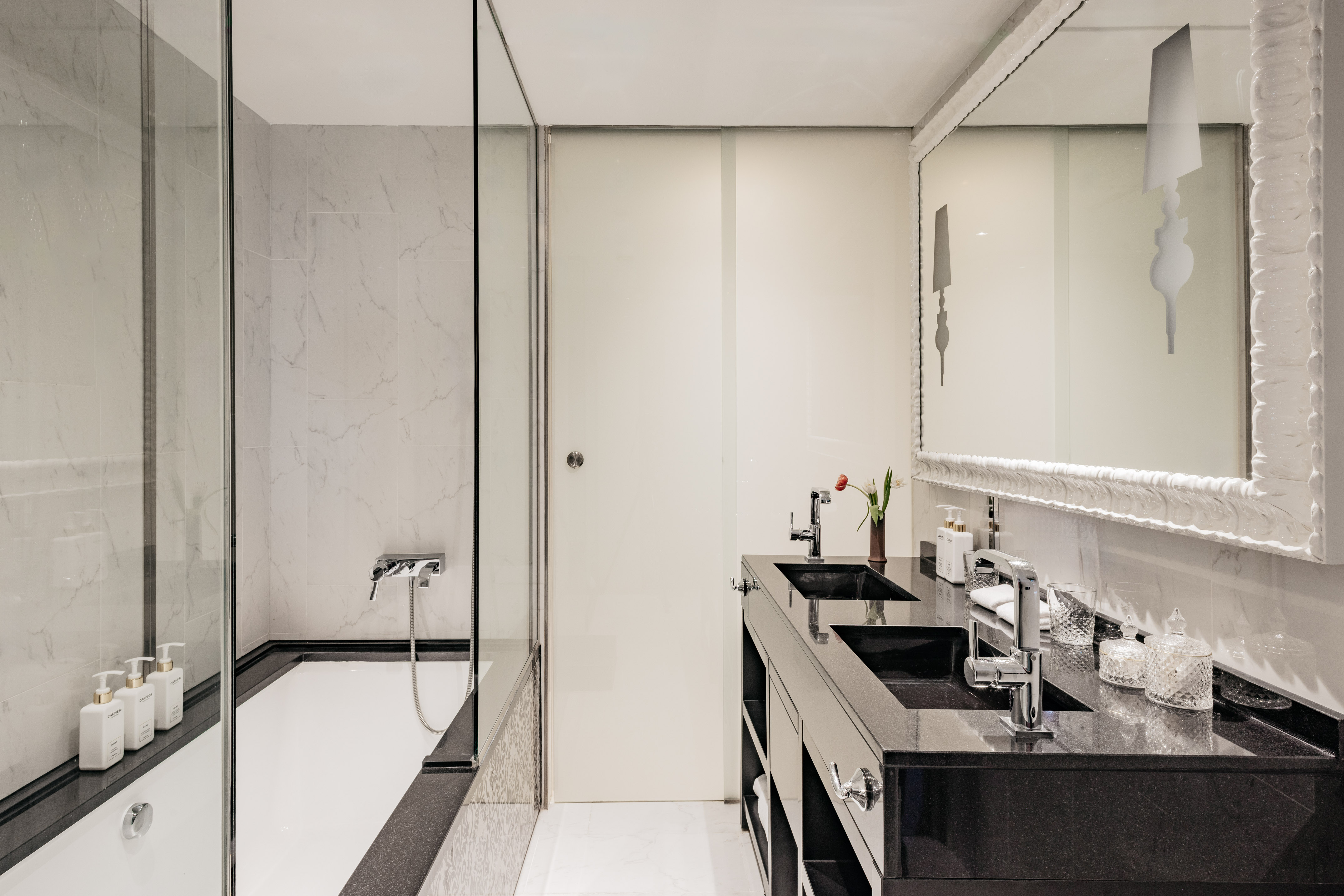 a bathroom with a shower and sink