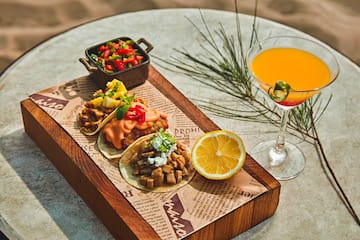 a plate of food and a drink