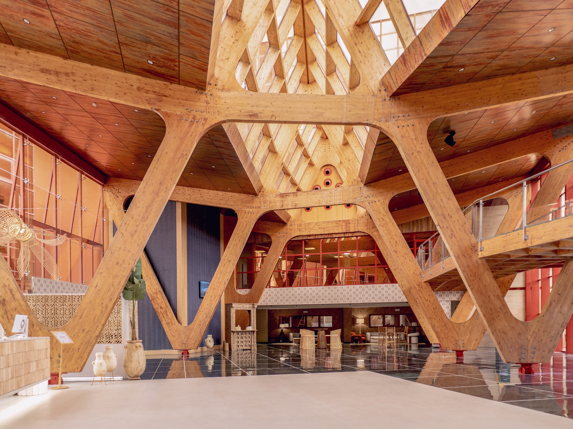 a large wooden structure with a glass ceiling