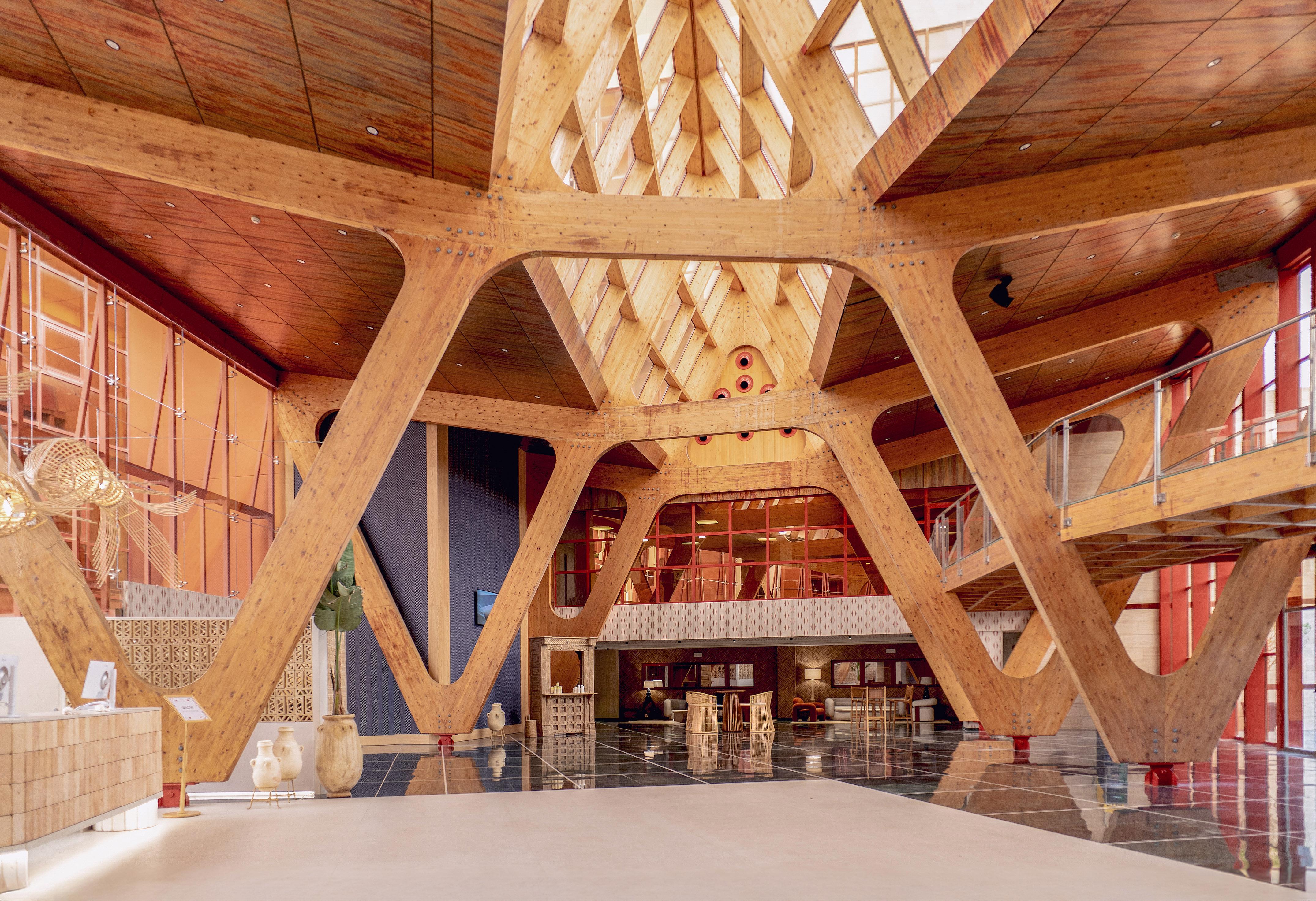 a large wooden structure with a glass ceiling