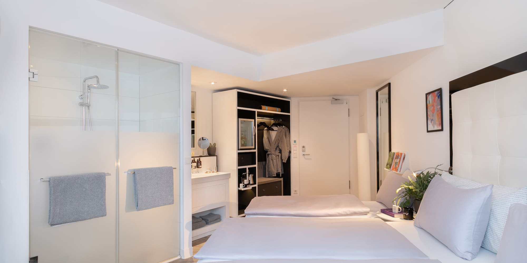 a room with a bed and shower