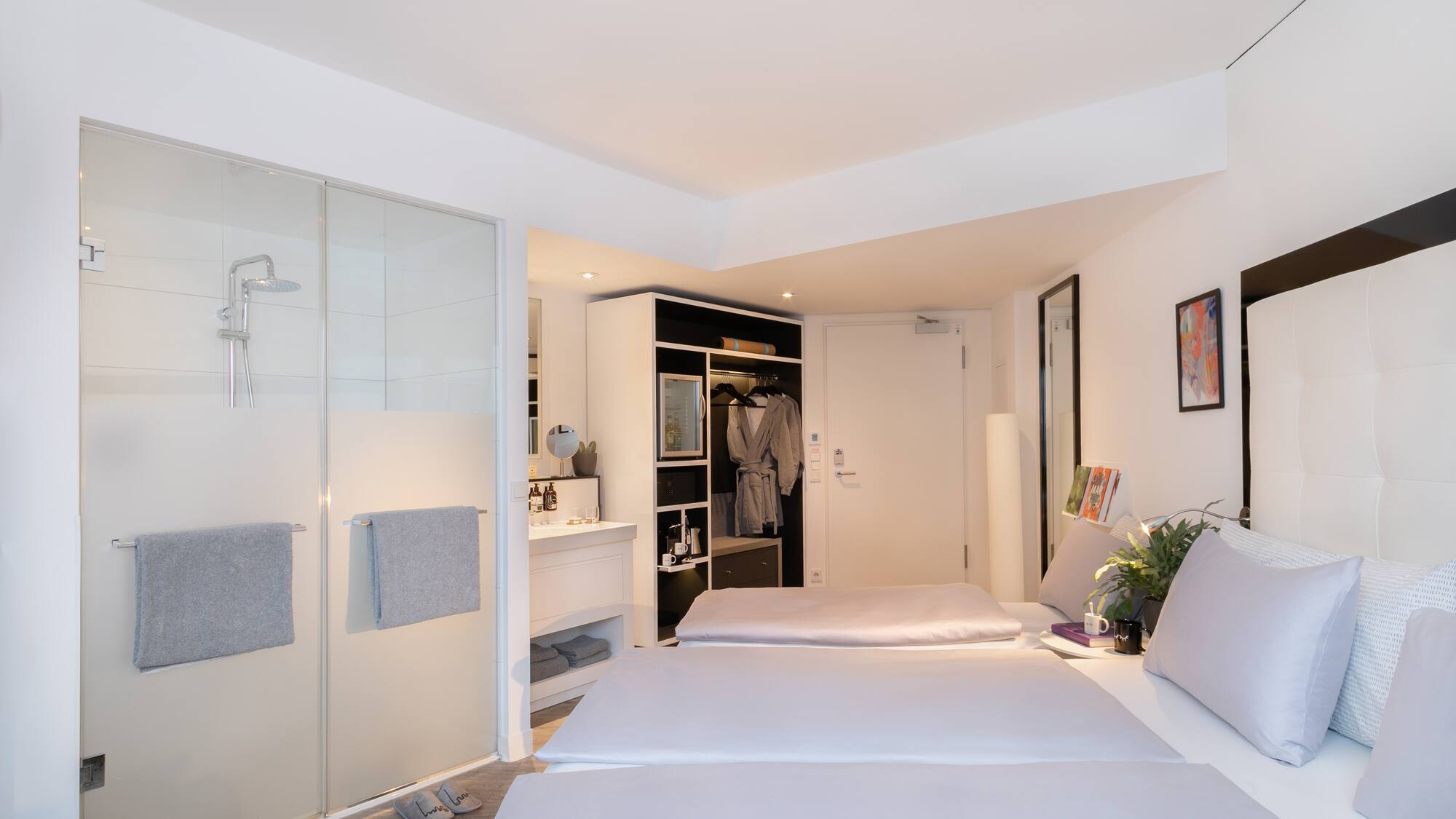 a room with a bed and shower