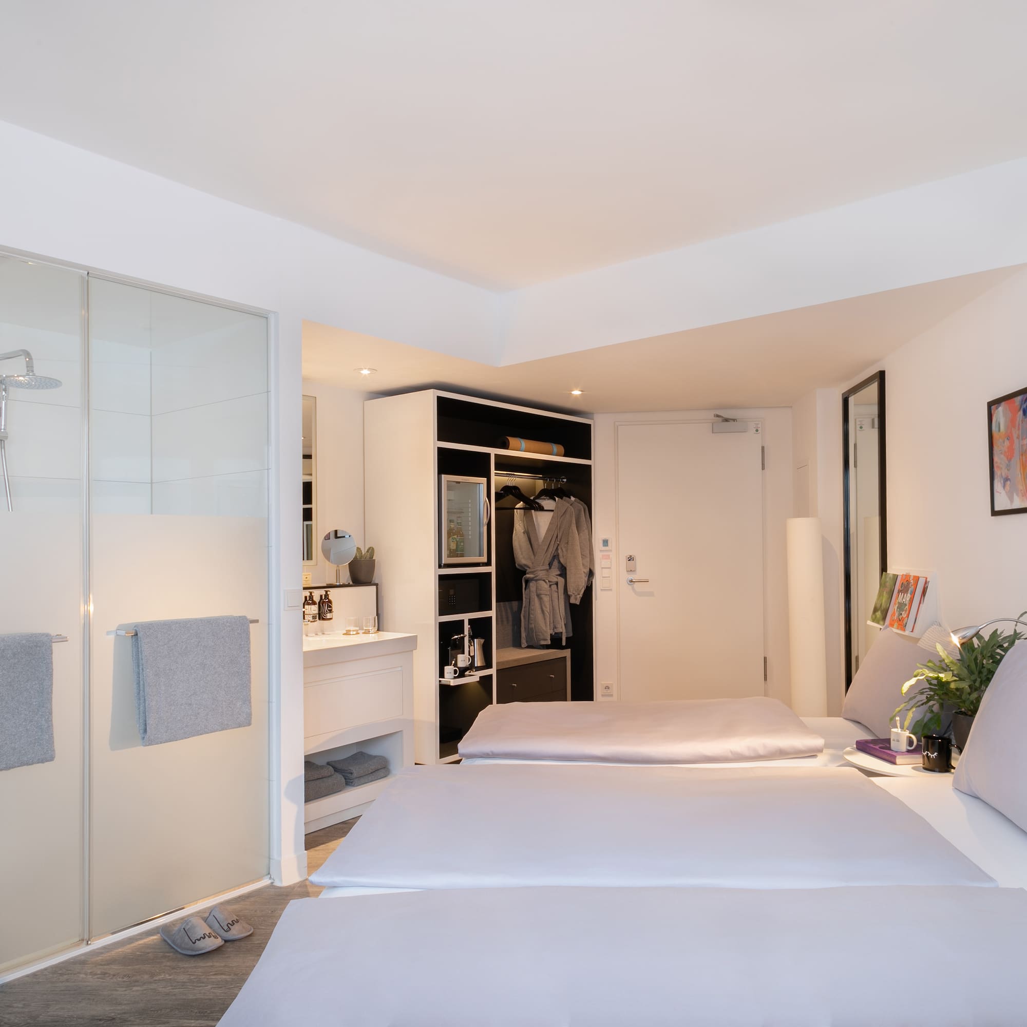 a room with a bed and shower