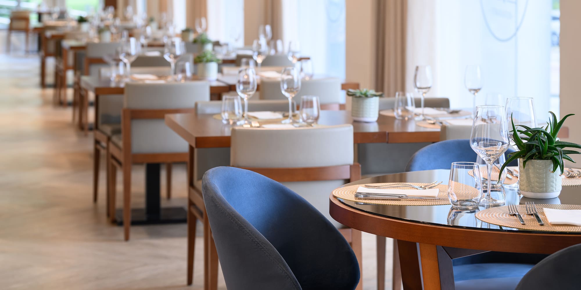 a restaurant with tables and chairs